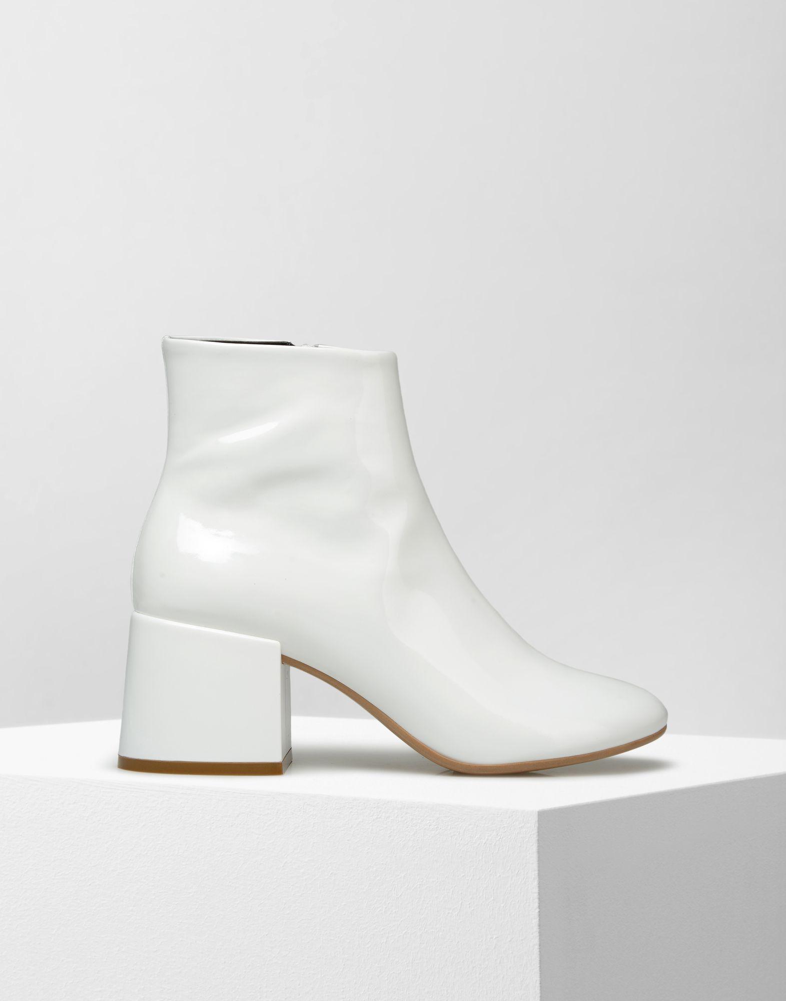 patent leather boots white