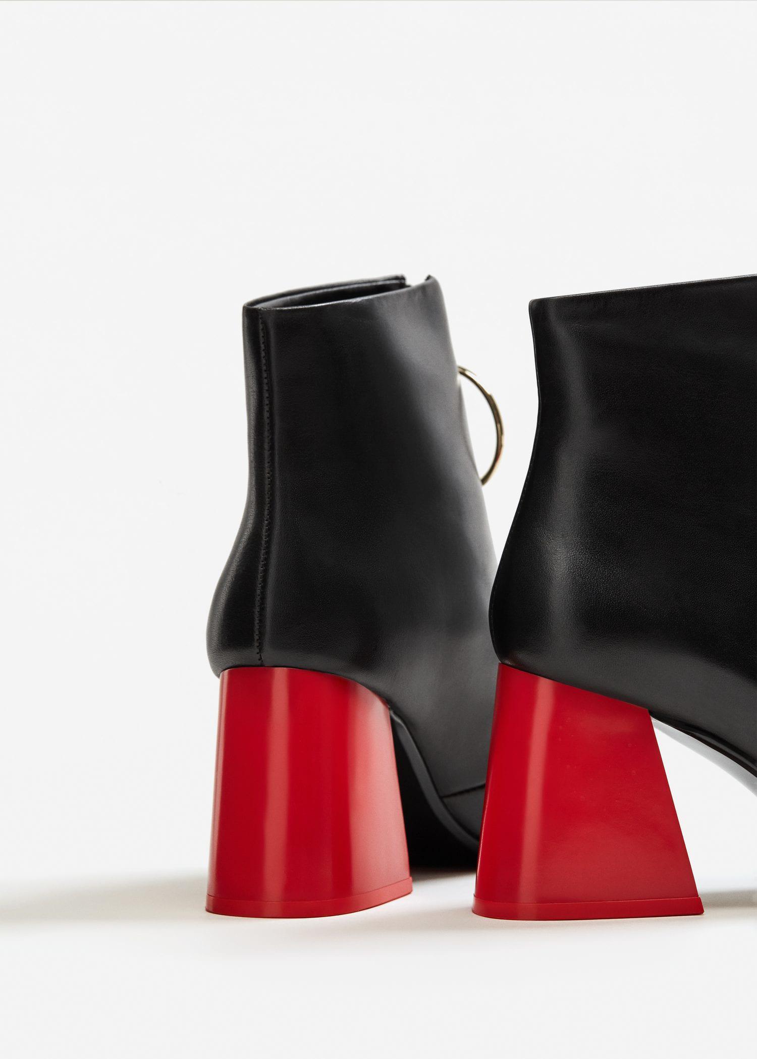 black booties with red heel