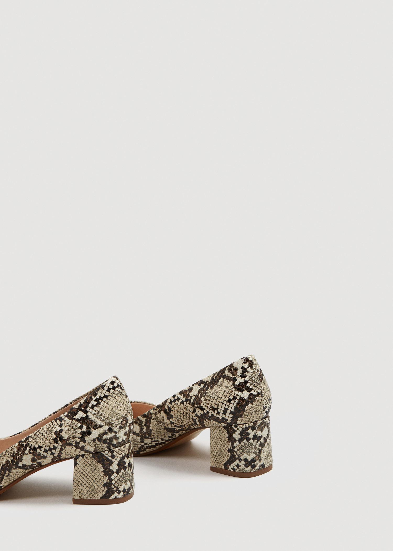 snakeskin print pumps