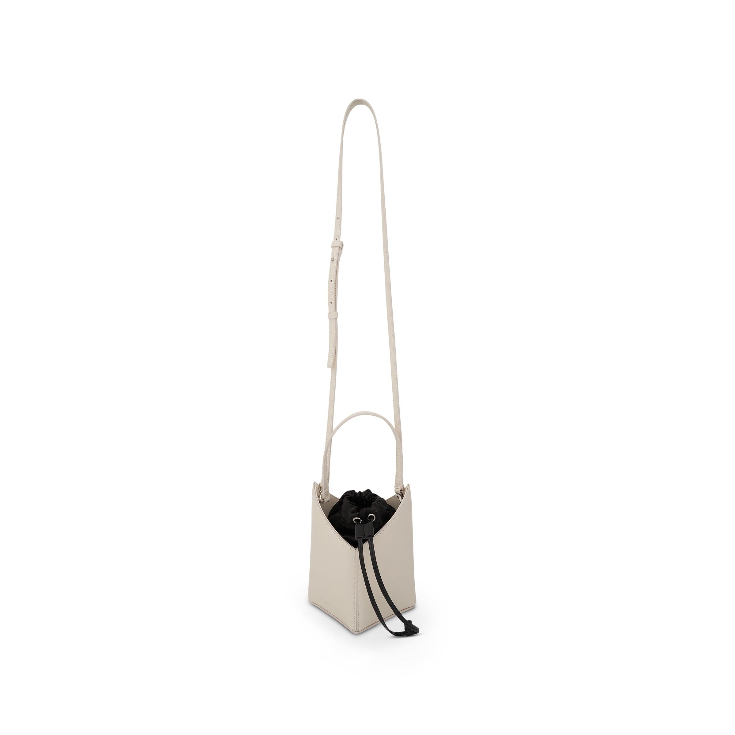 - Save 6% Givenchy Two-tone Leather Mini Cut Out Bucket Bag in White Black Womens Bags Bucket bags and bucket purses 