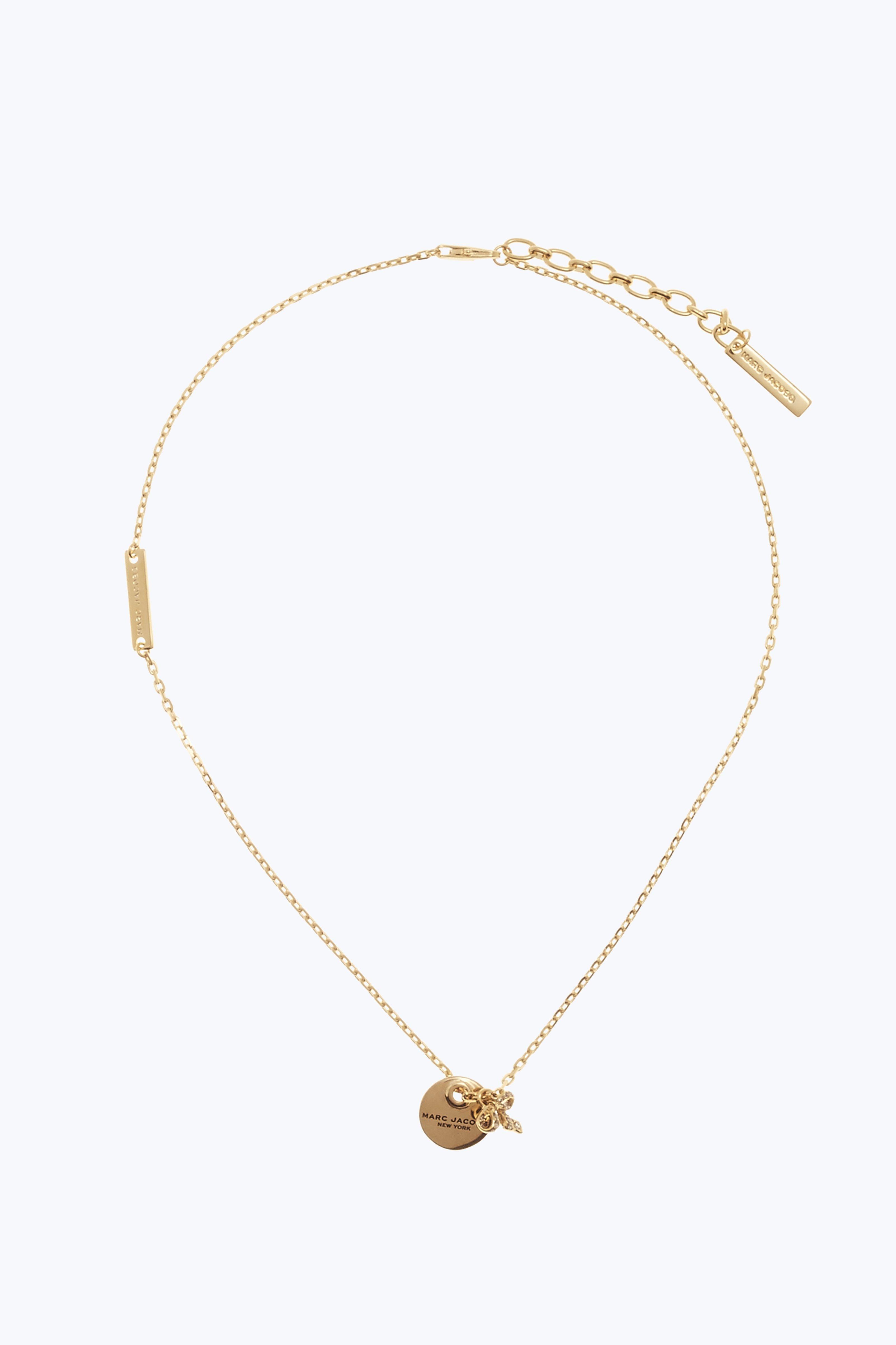 Lyst Marc Jacobs Mj Coin Bow Pendant Necklace In Metallic Gallery