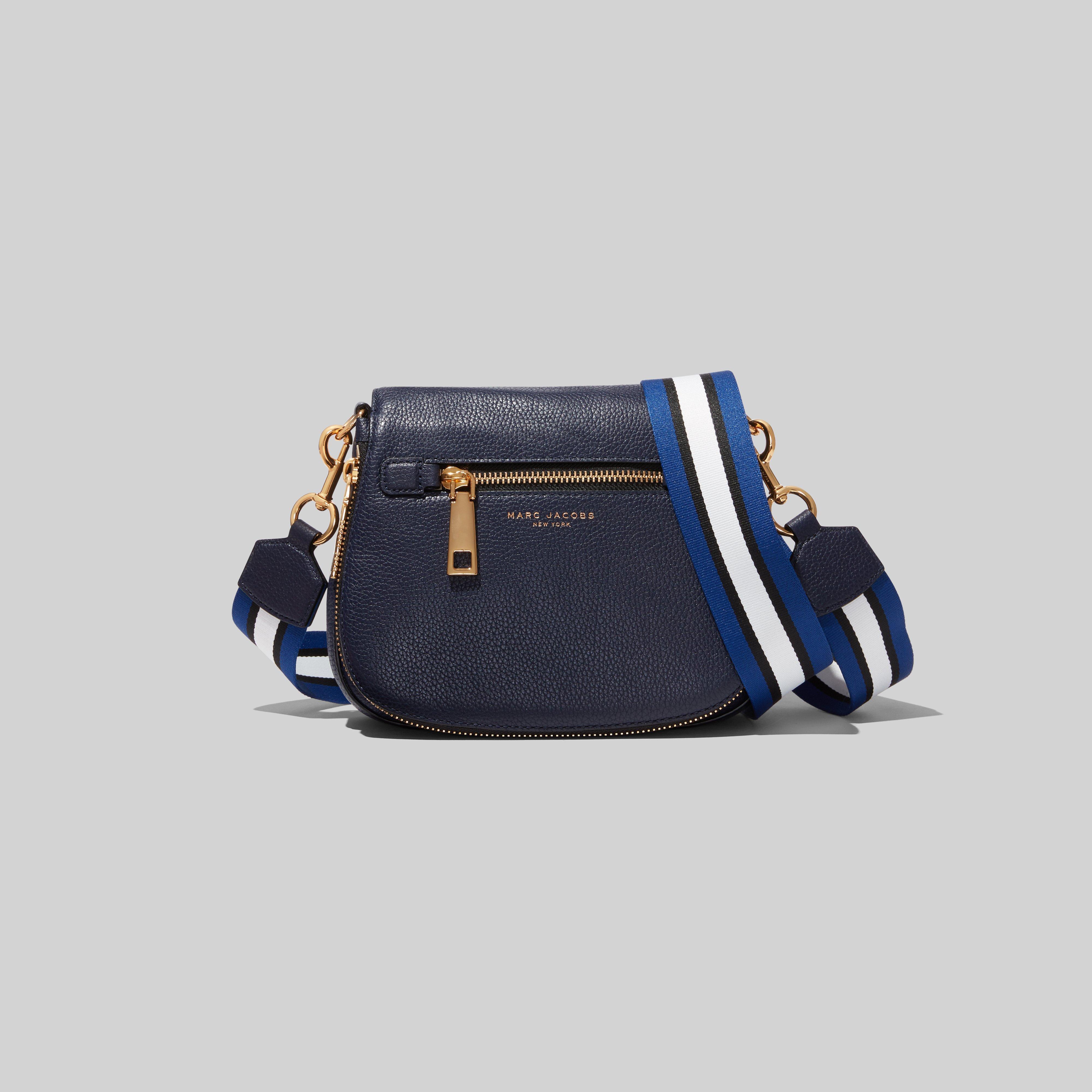 small nomad crossbody bolsa
