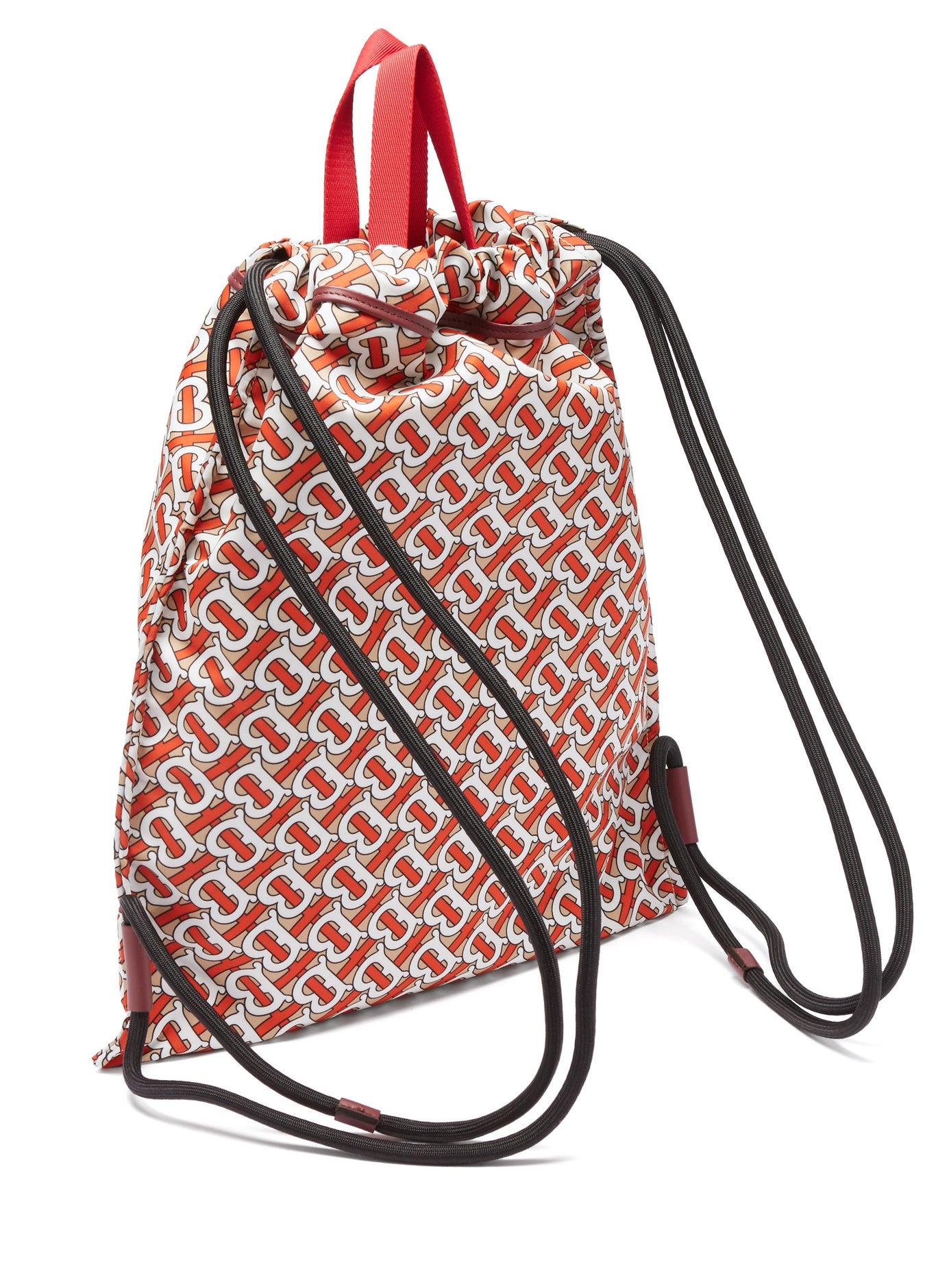 Burberry Leather Bobby Tb-print Drawstring Backpack in Red for Men - Lyst