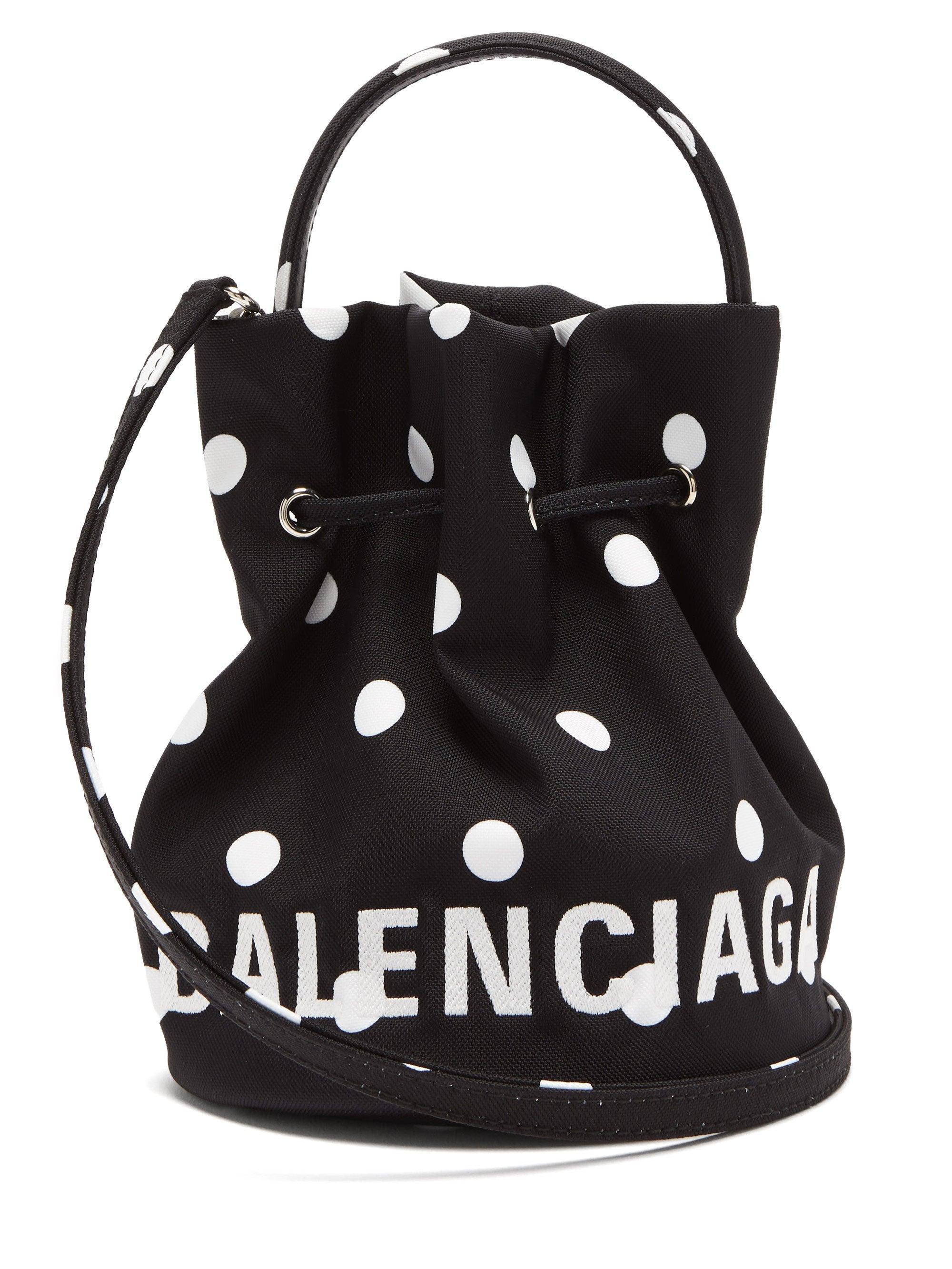 Balenciaga Wheel Xs Polkadot Canvas Bucket Bag in Black Lyst