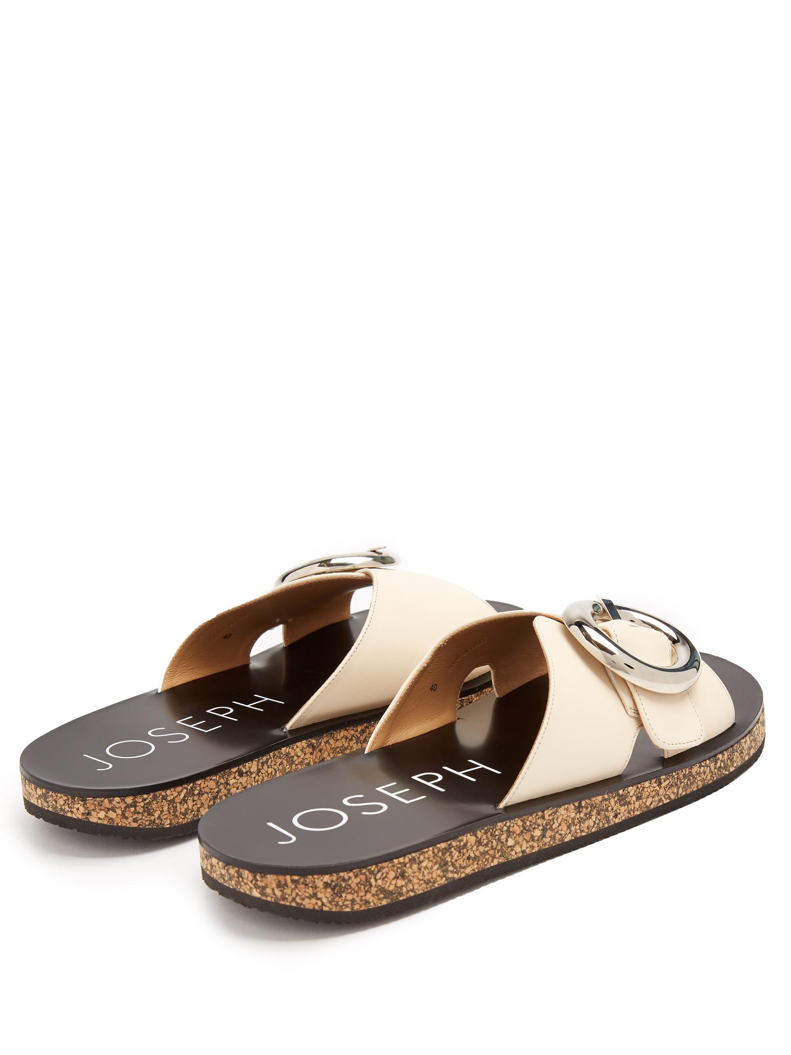 buckled leather slides