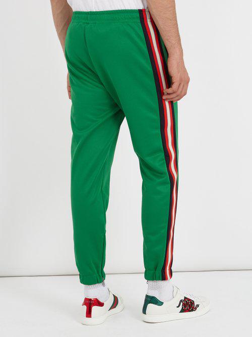 Gucci Synthetic Side-stripe Tapered-leg Jersey Track Pants in Green for ...