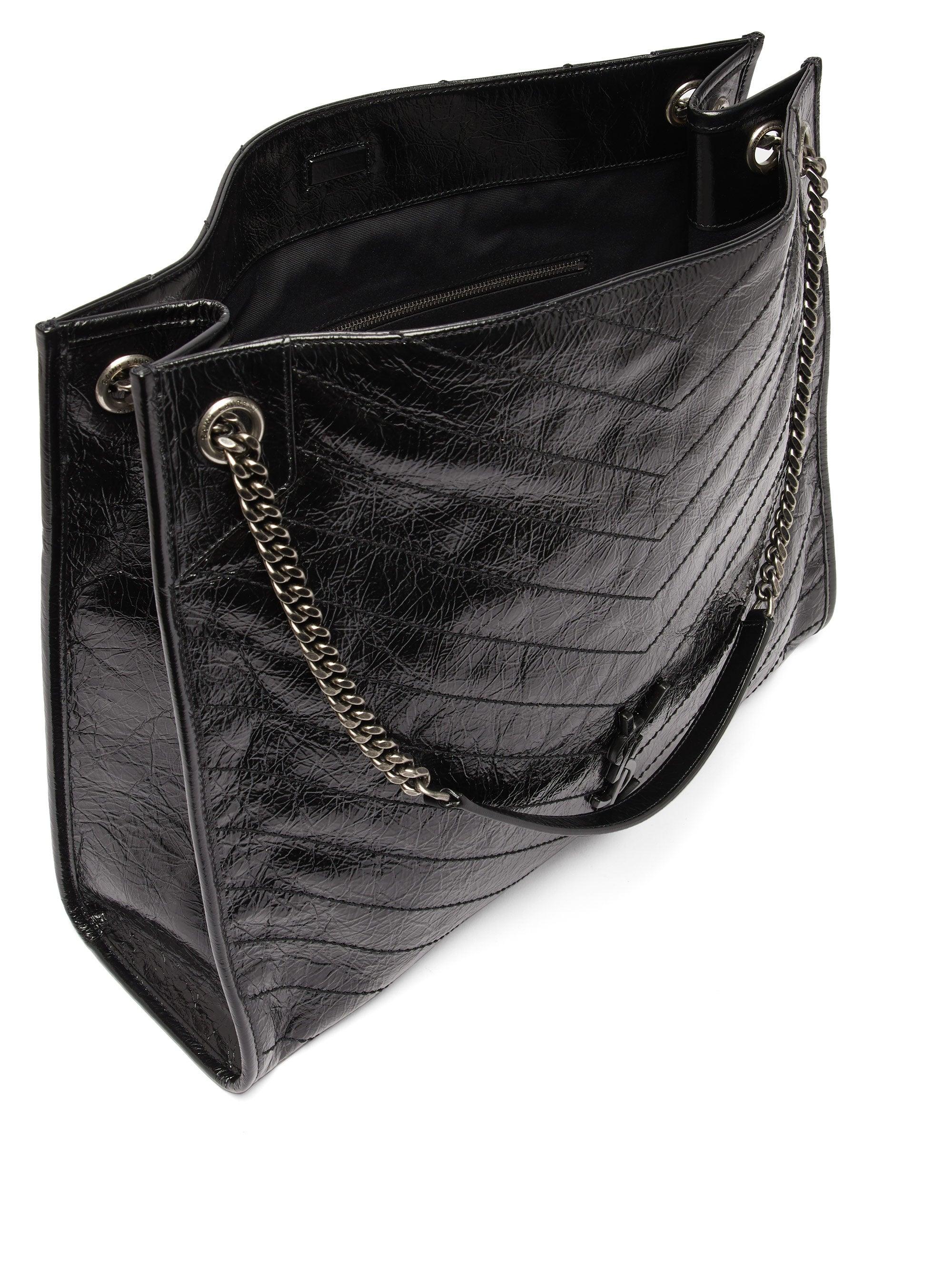 SAINT LAURENT: Niki bag in quilted leather - Black