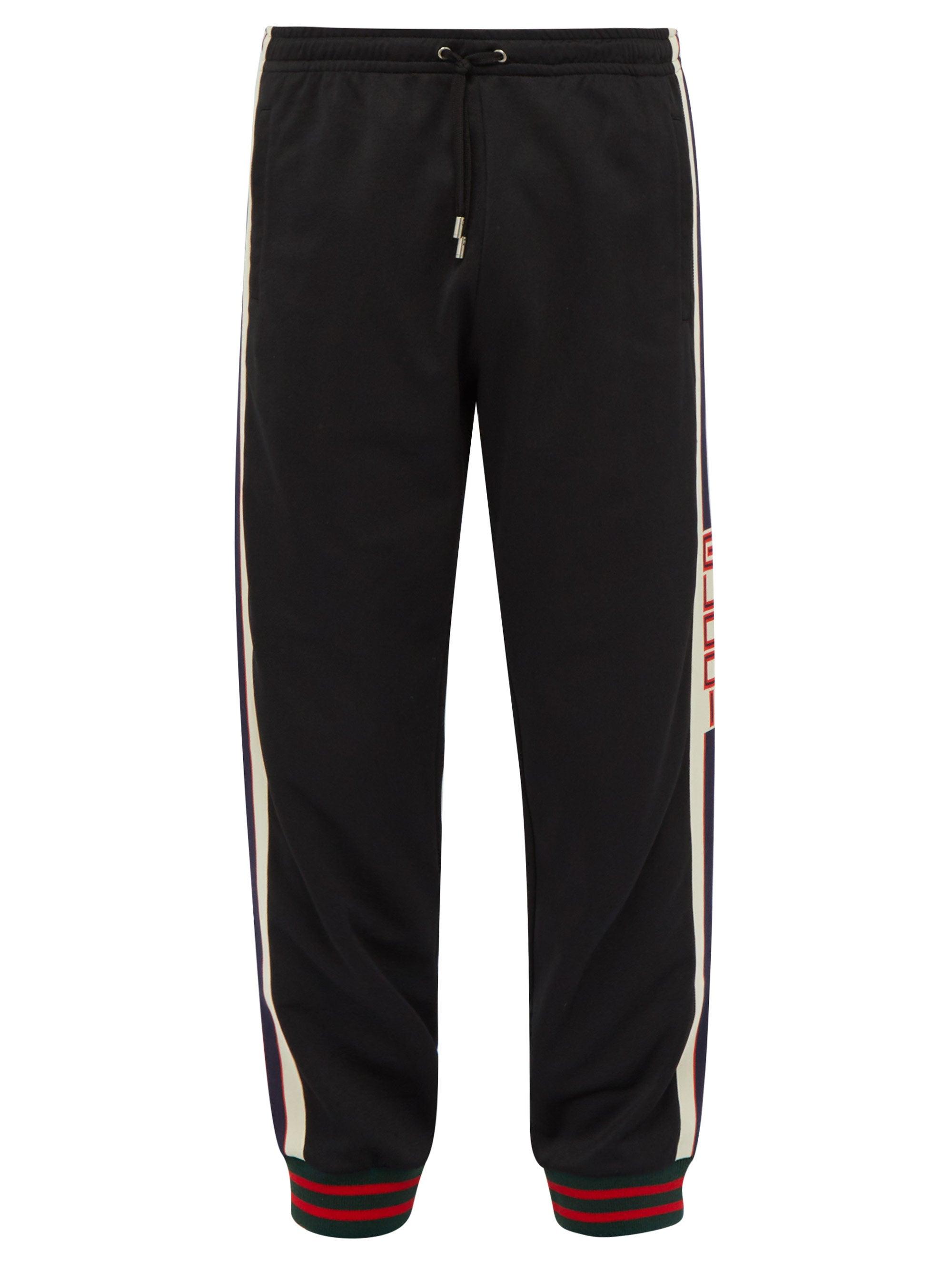 white and black gucci sweatpants
