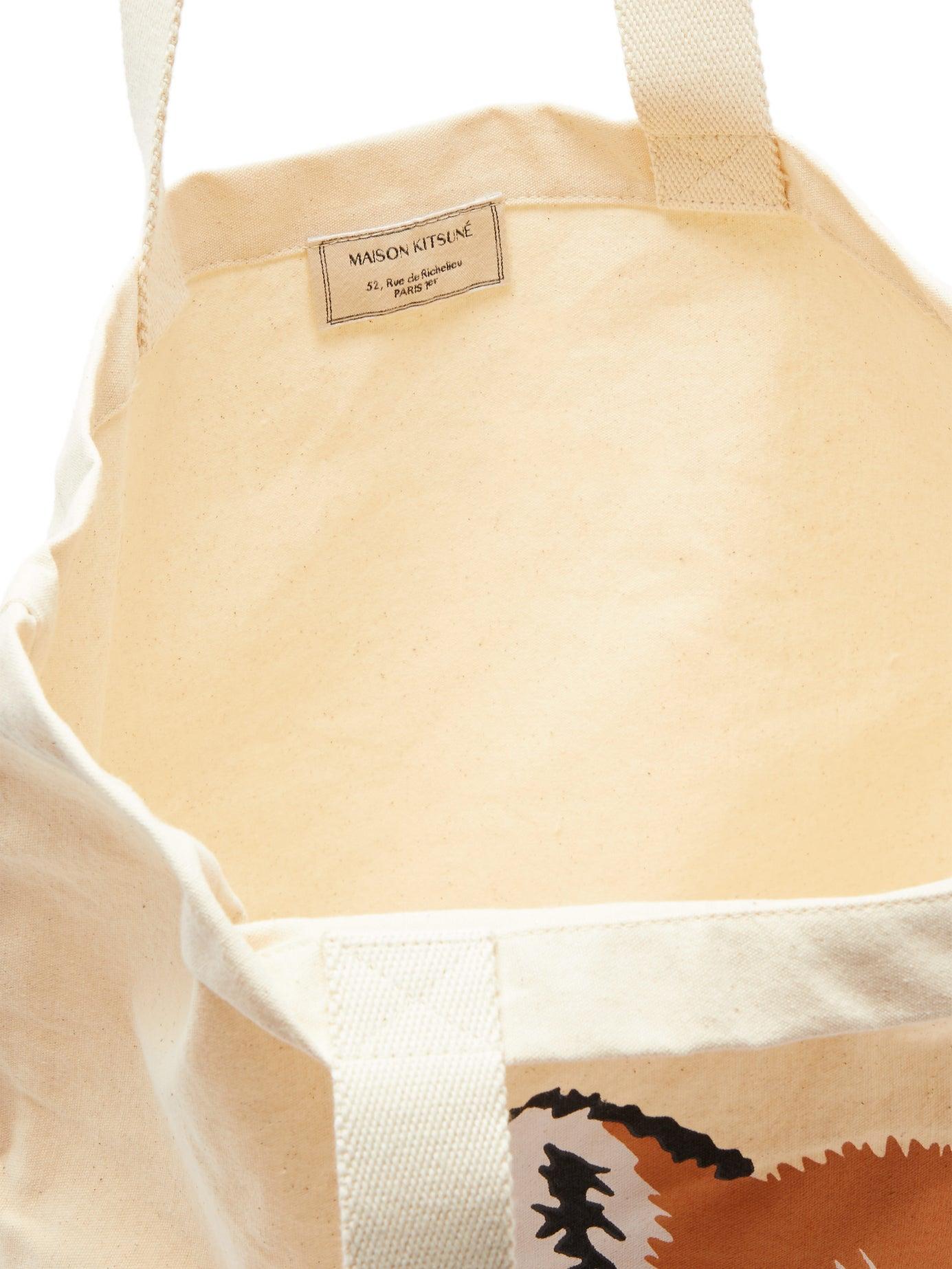 tote backpack resting fox