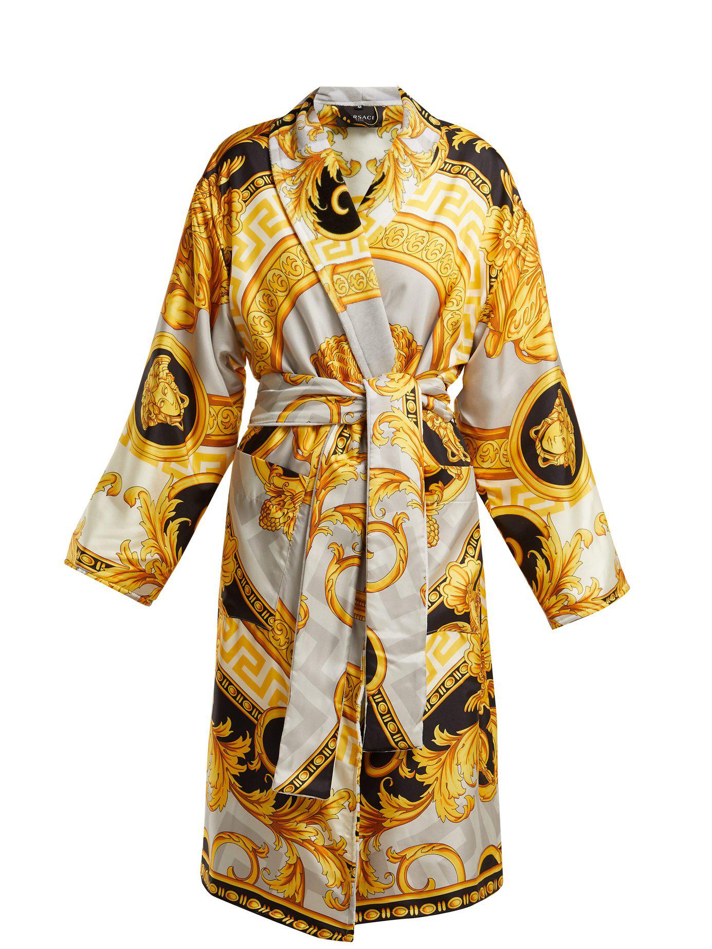 https://cdna.lystit.com/photos/matchesfashion/6d5a14cc/versace-grey-gold-La-Coupe-Des-Dieux-Baroque-Print-Silk-Robe.jpeg
