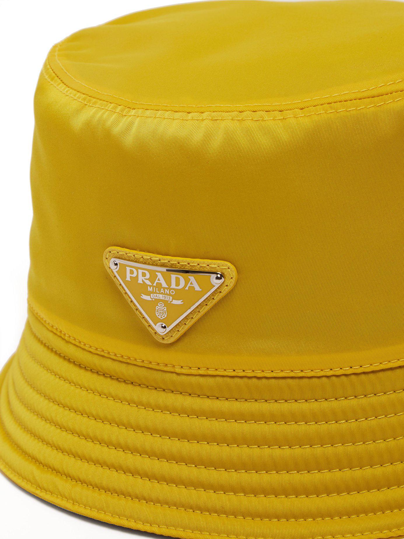 prada bucket hat yellow