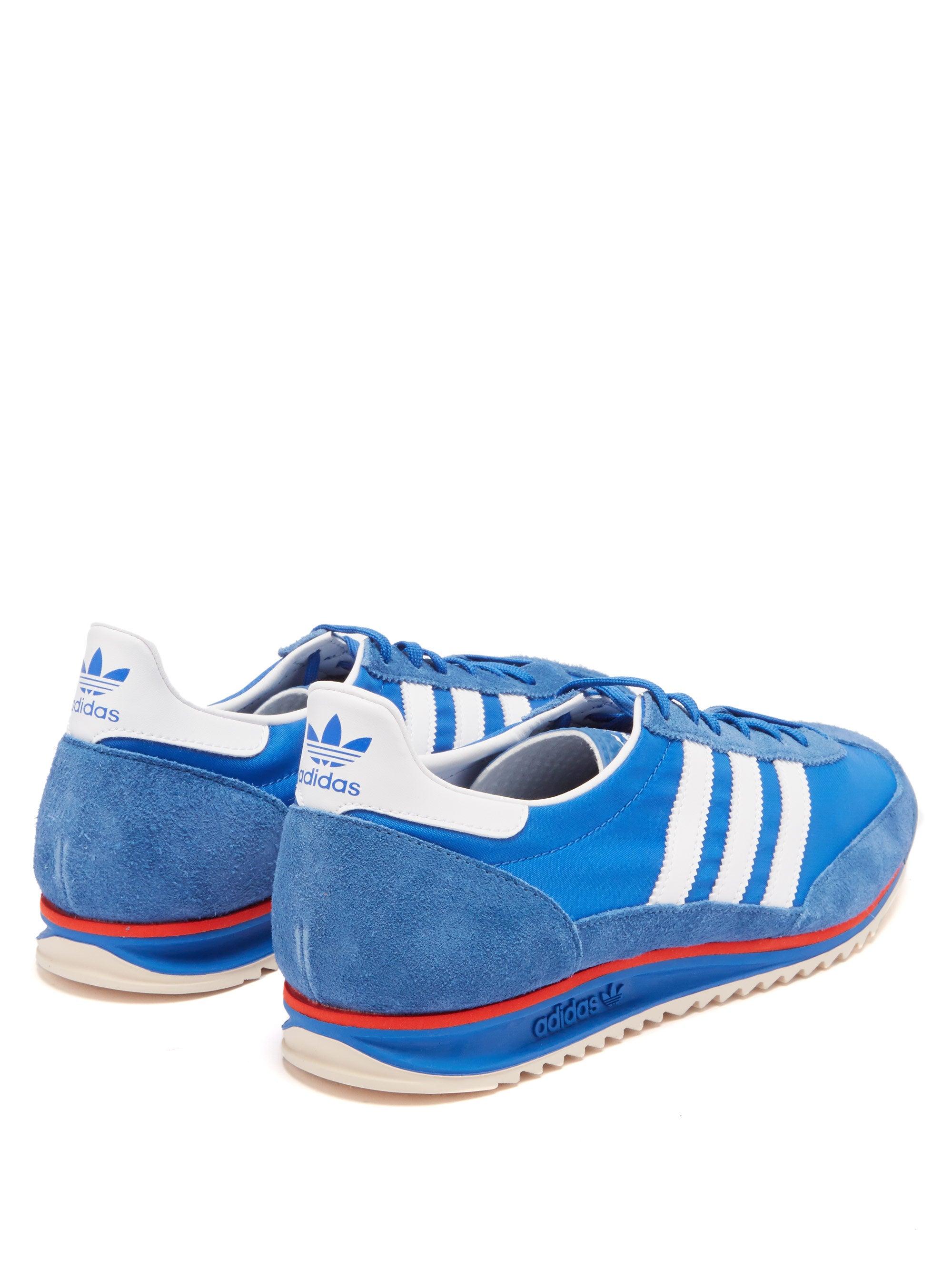 adidas blue canvas trainers