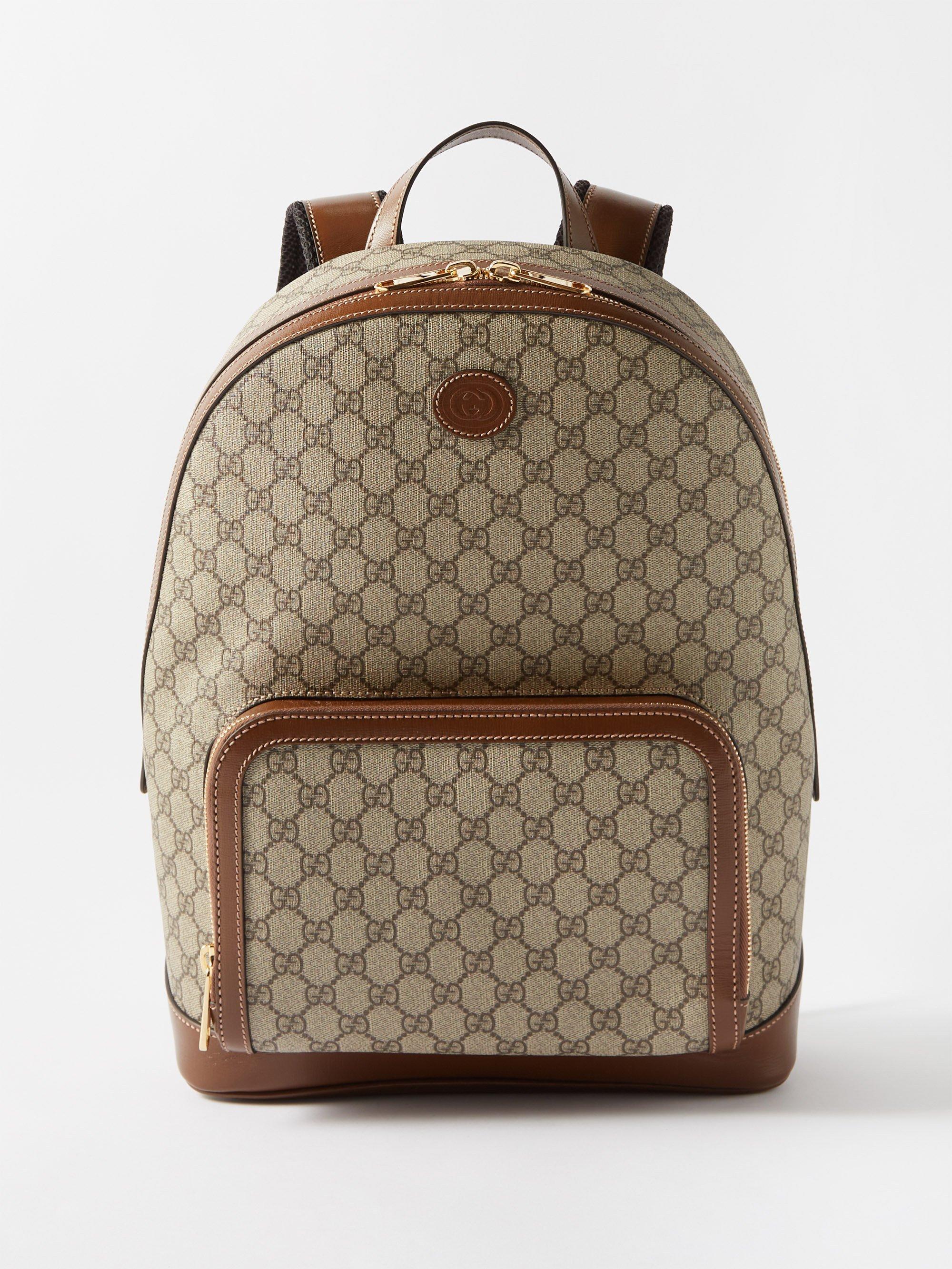 Shop the GG Supreme small backpack by Gucci. Small GG Supreme canvas  backpack, finished with black leather details.