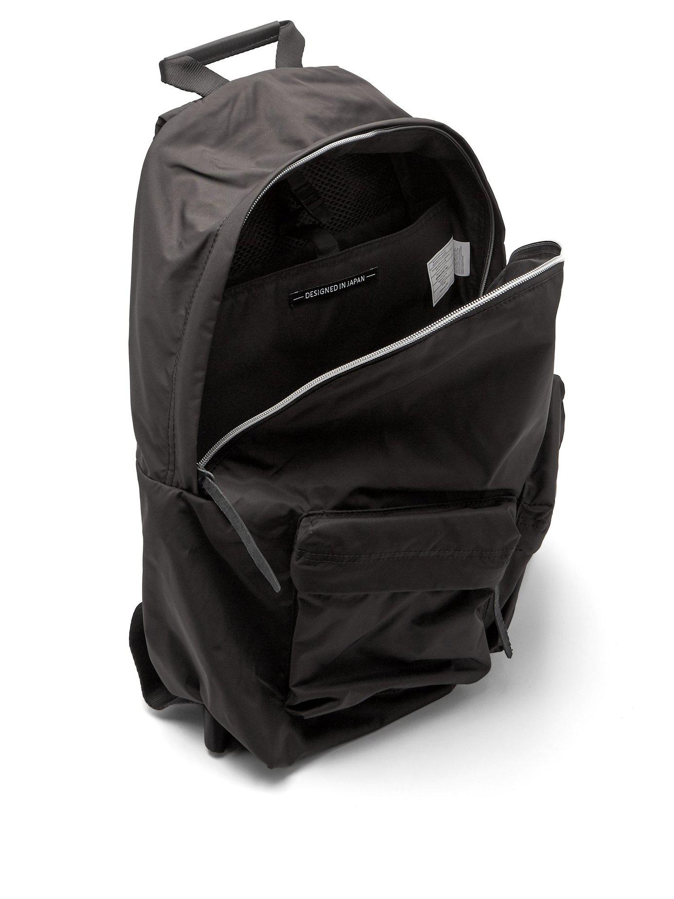 Eastpak Japan Padded Black Backpack for Men Lyst