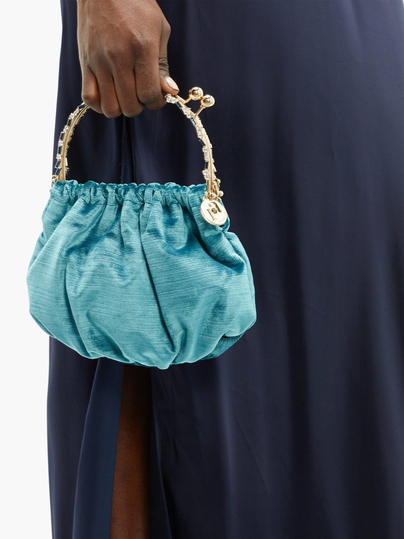 sabyaensacarhi velvet clutch