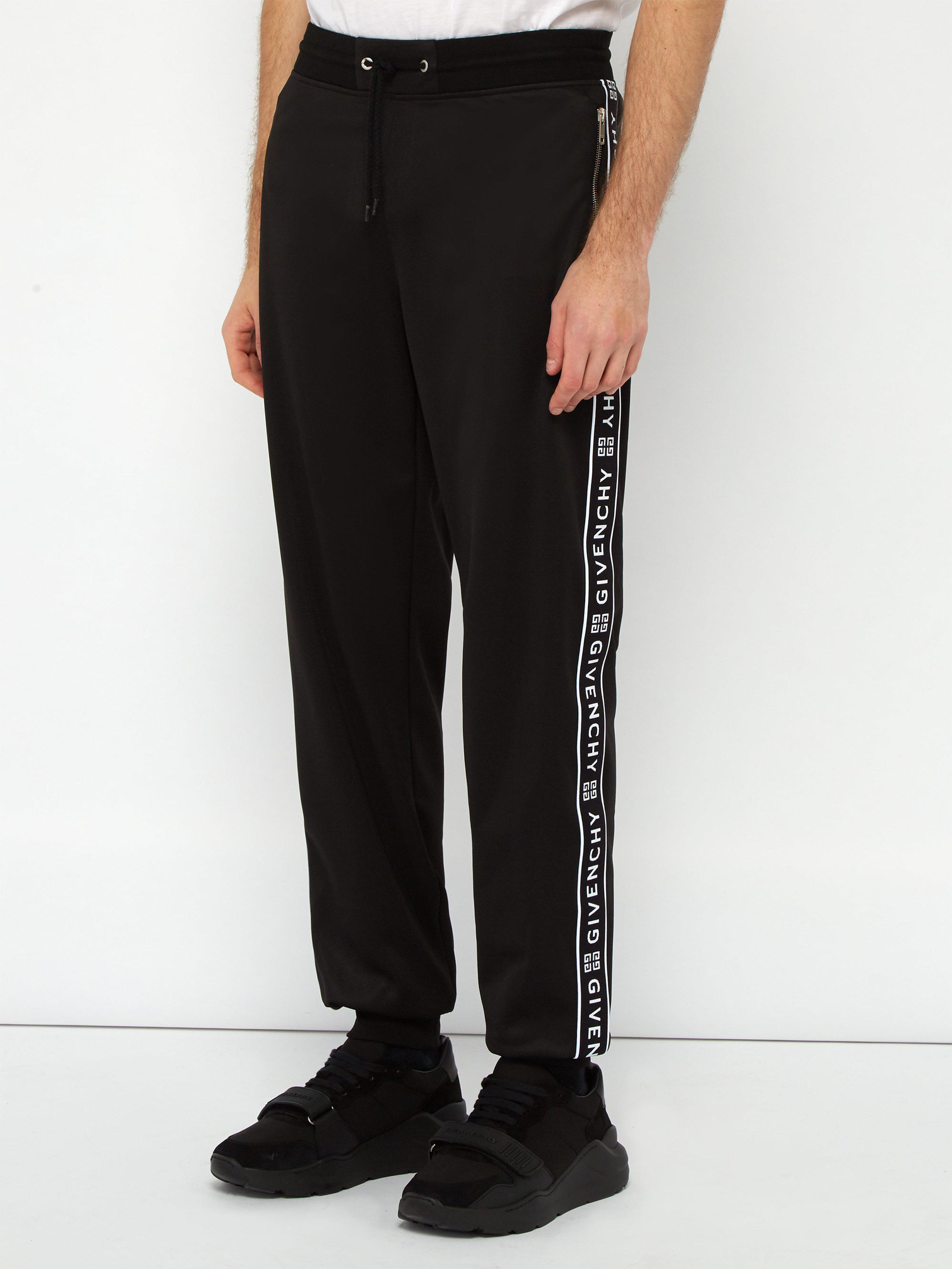 Pantalon de jogging à bandes latérales à logo Givenchy pour homme en  coloris Noir | Lyst