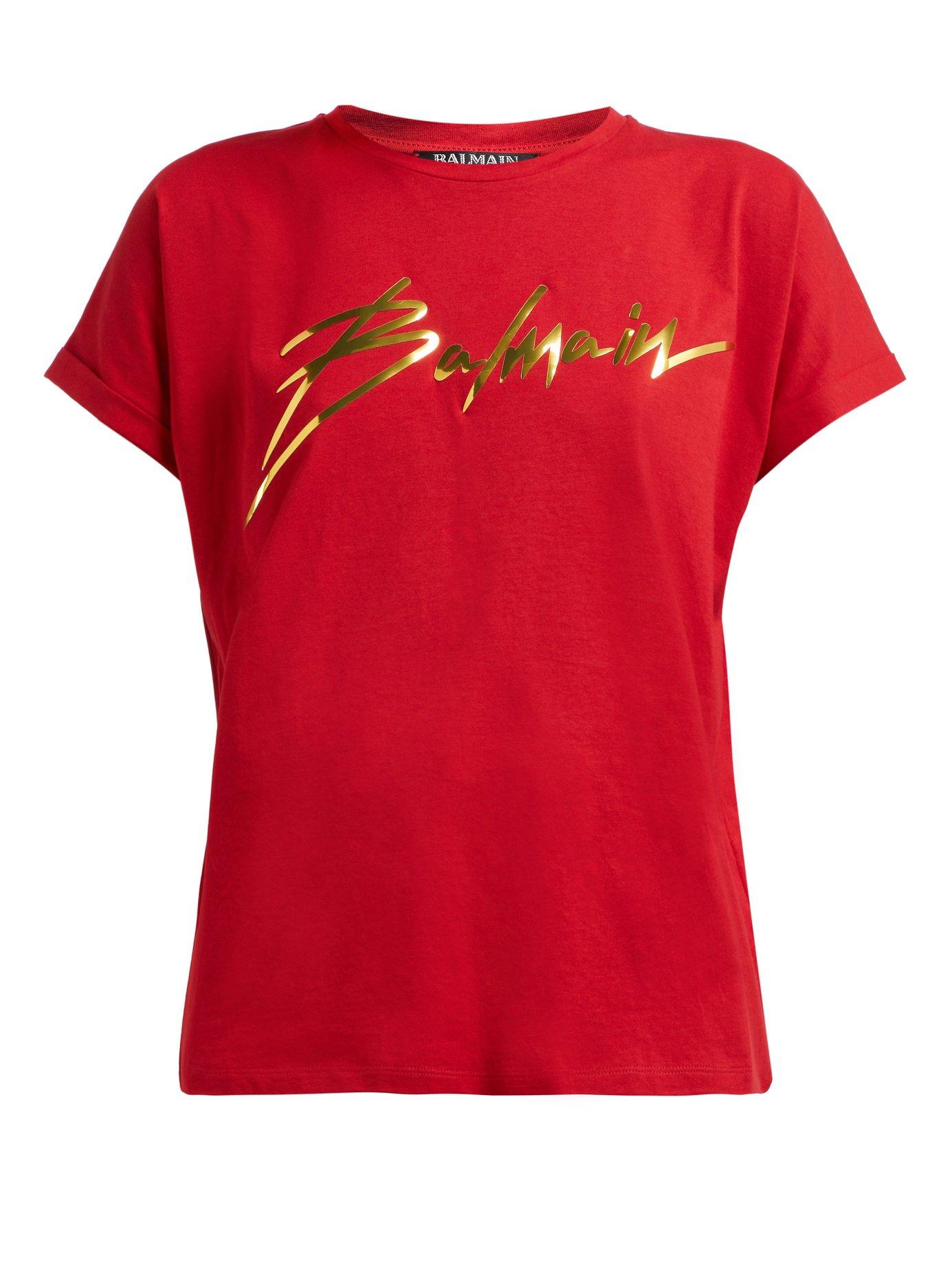 Red shirt with gold print sales