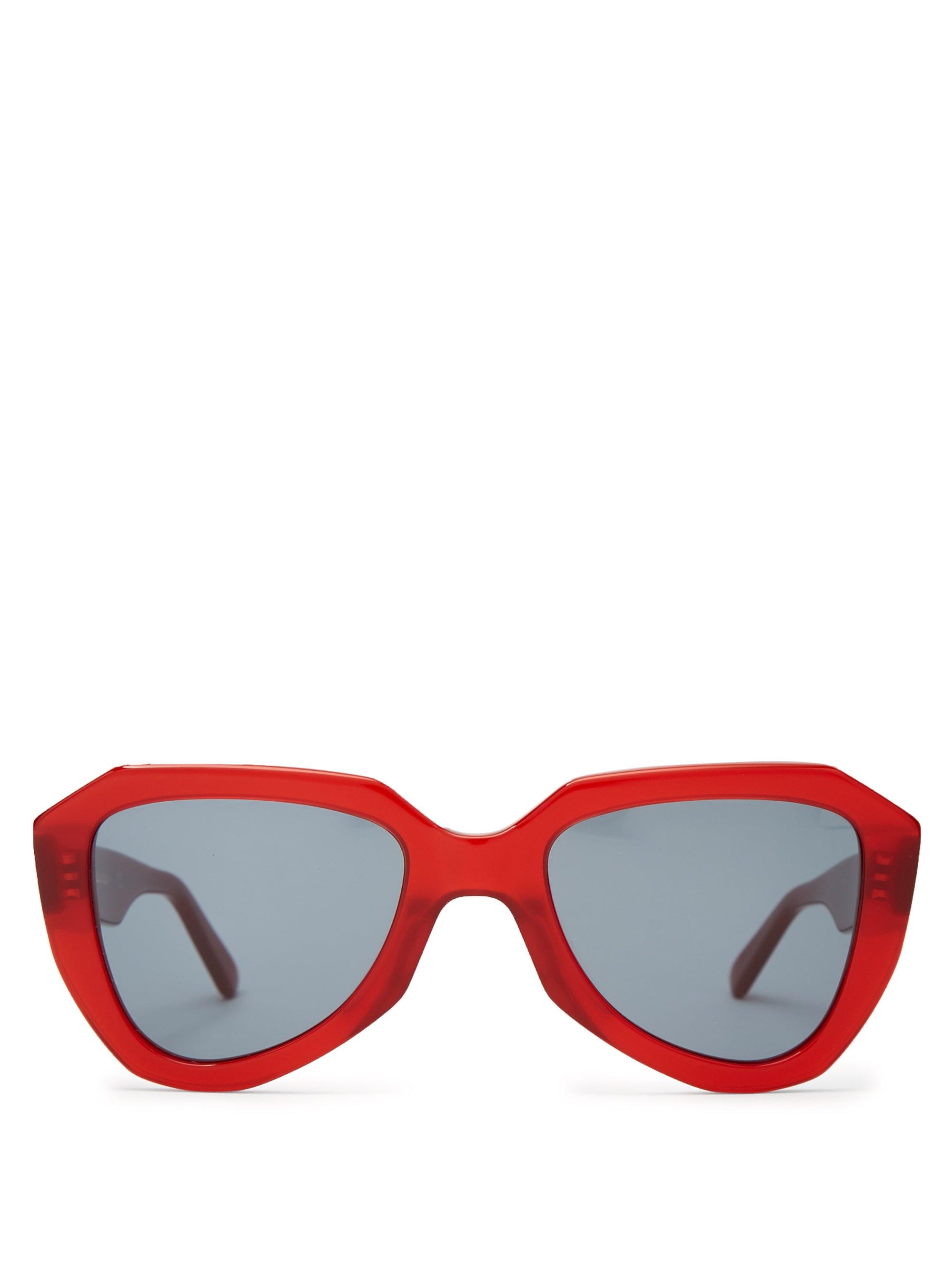 round gucci sunglasses with writing