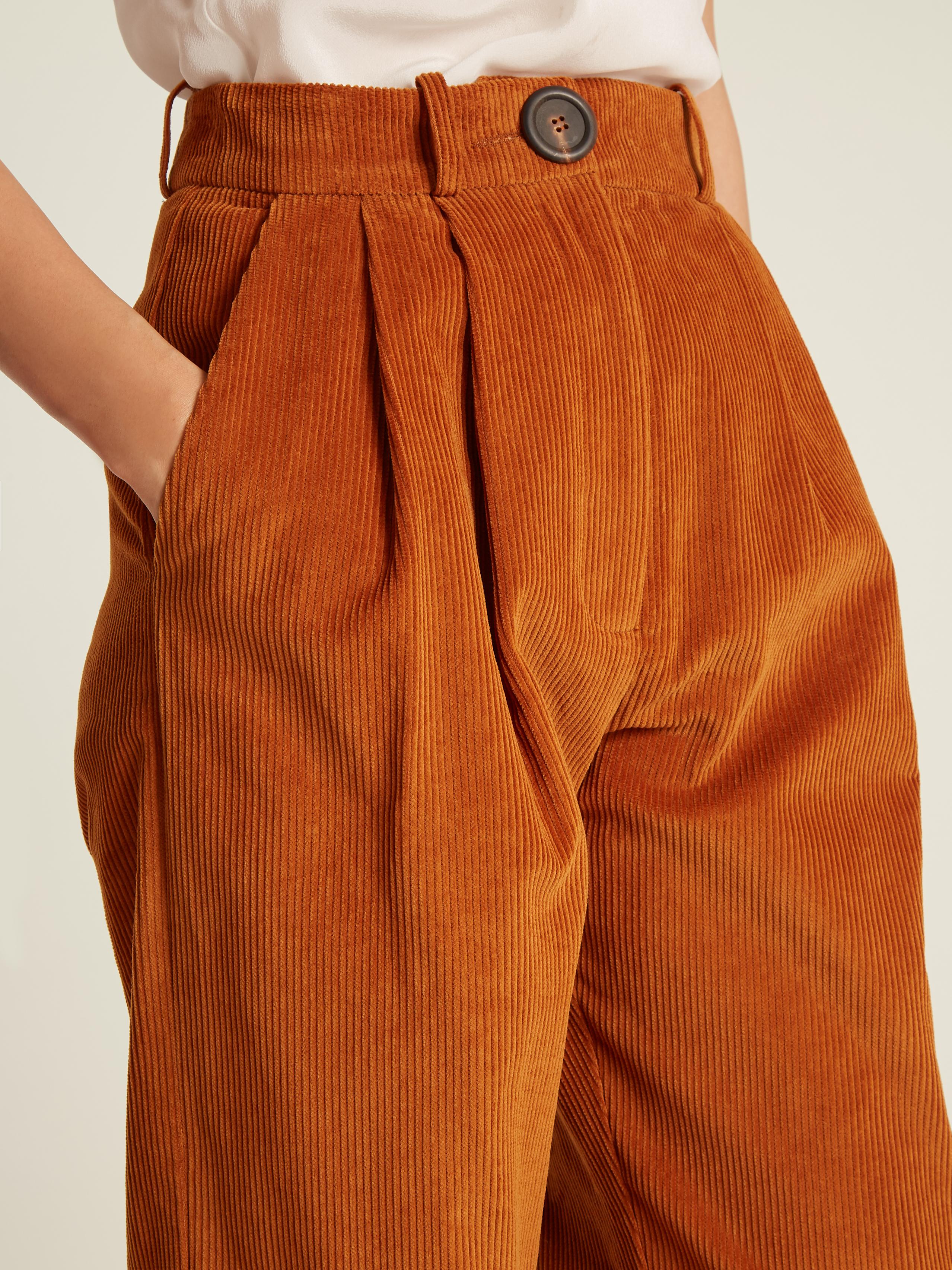 green high waisted corduroy pants
