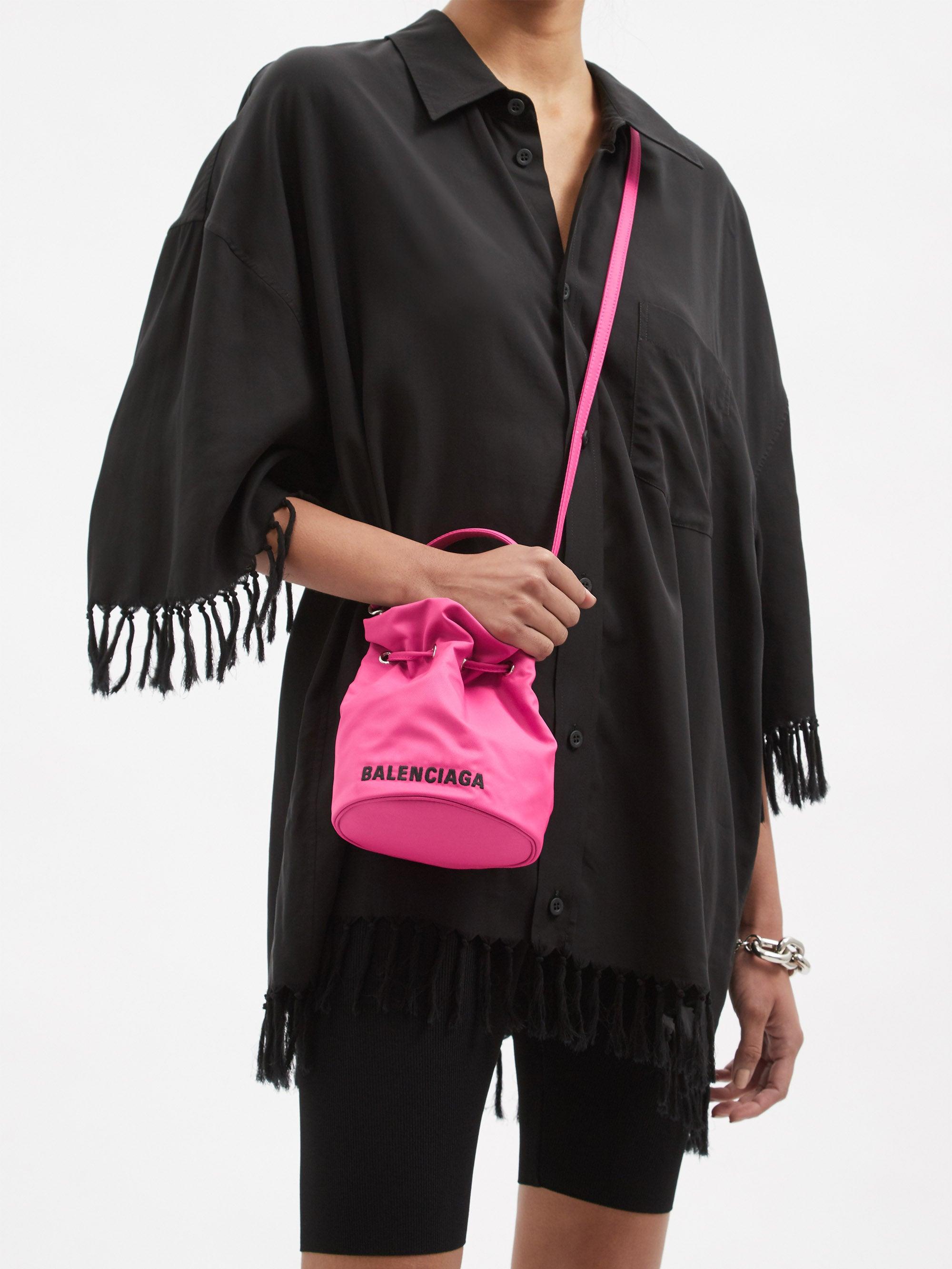 Balenciaga Wheel Xs Canvas Bucket Bag in Pink | Lyst
