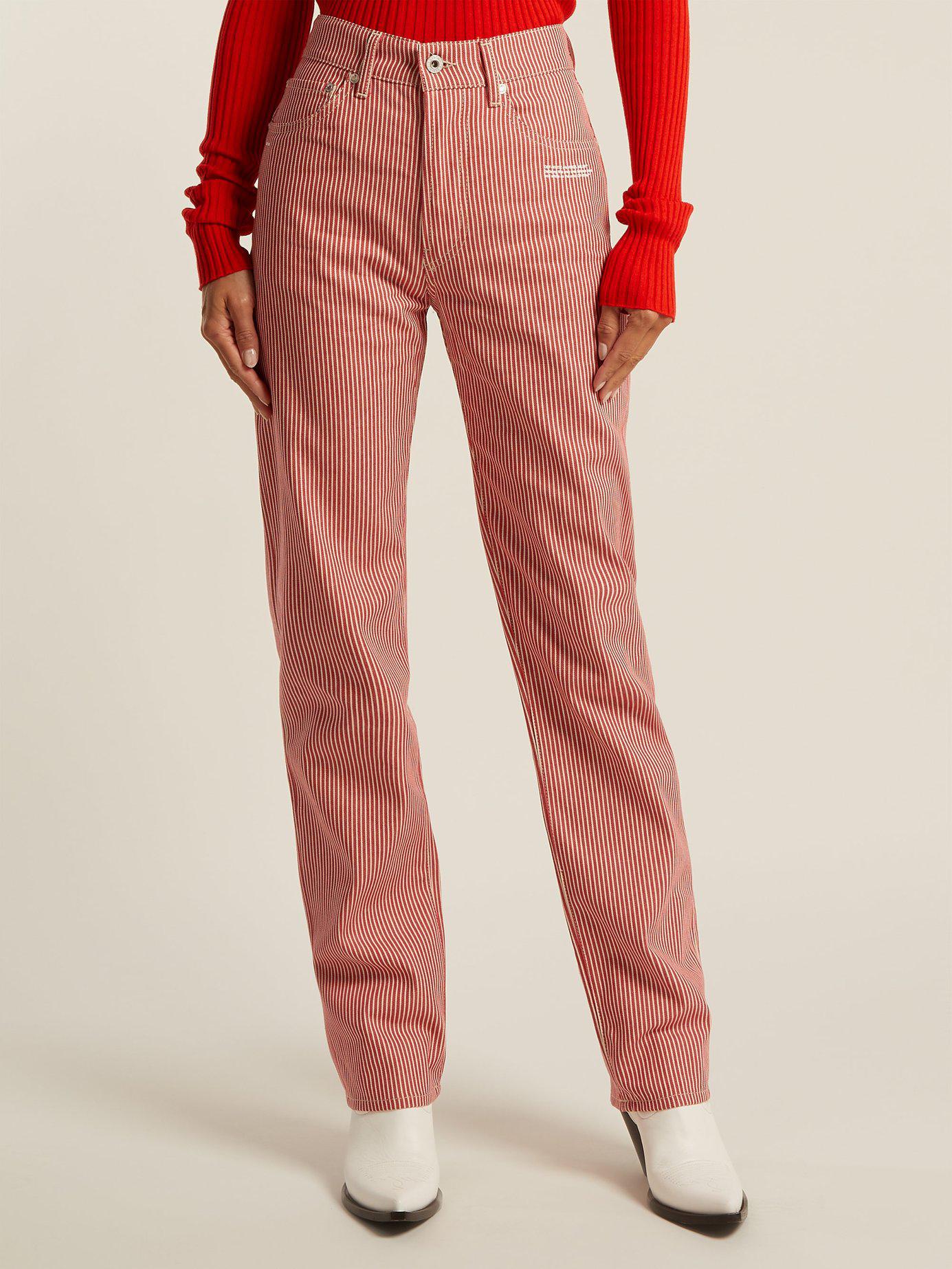 Jeans with red shop and white stripe