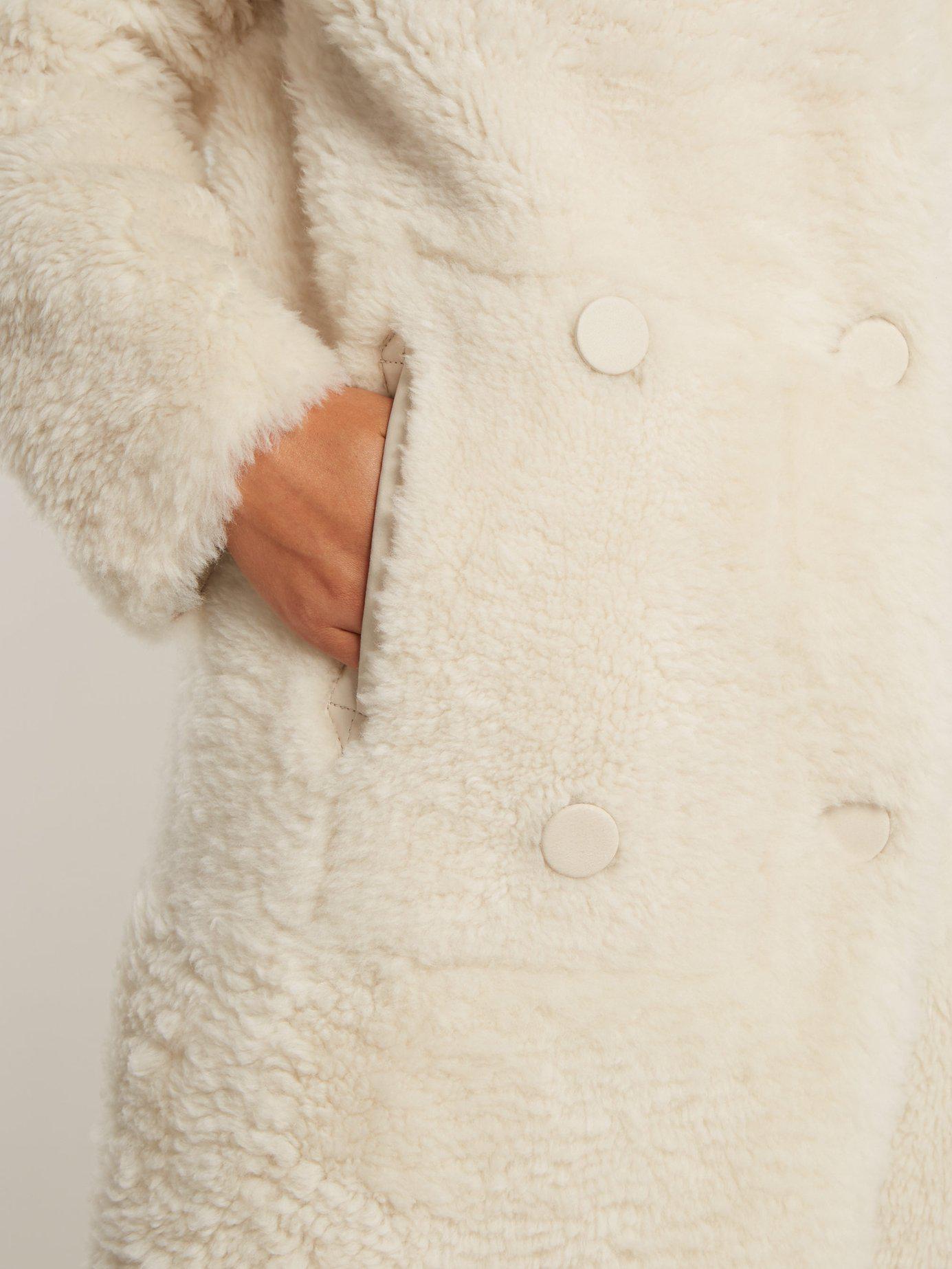 cream sheepskin coat