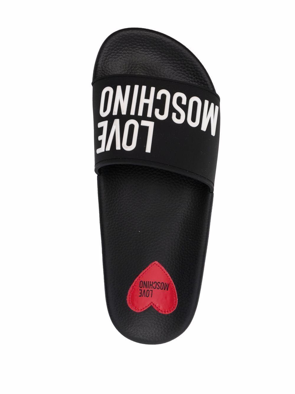 Love Moschino Rubber Logo Open-toe Slides in Black - Save 45% - Lyst