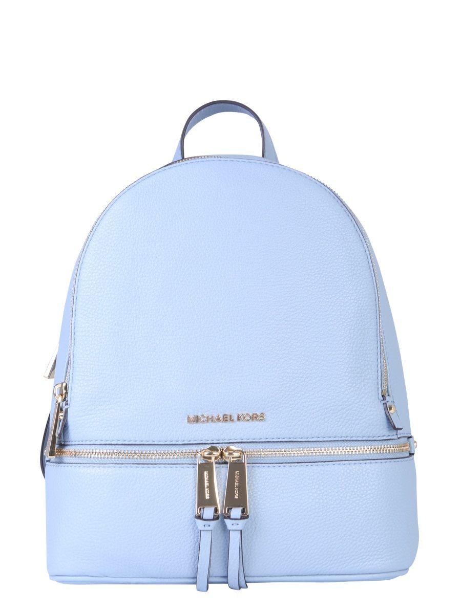 light blue leather backpack