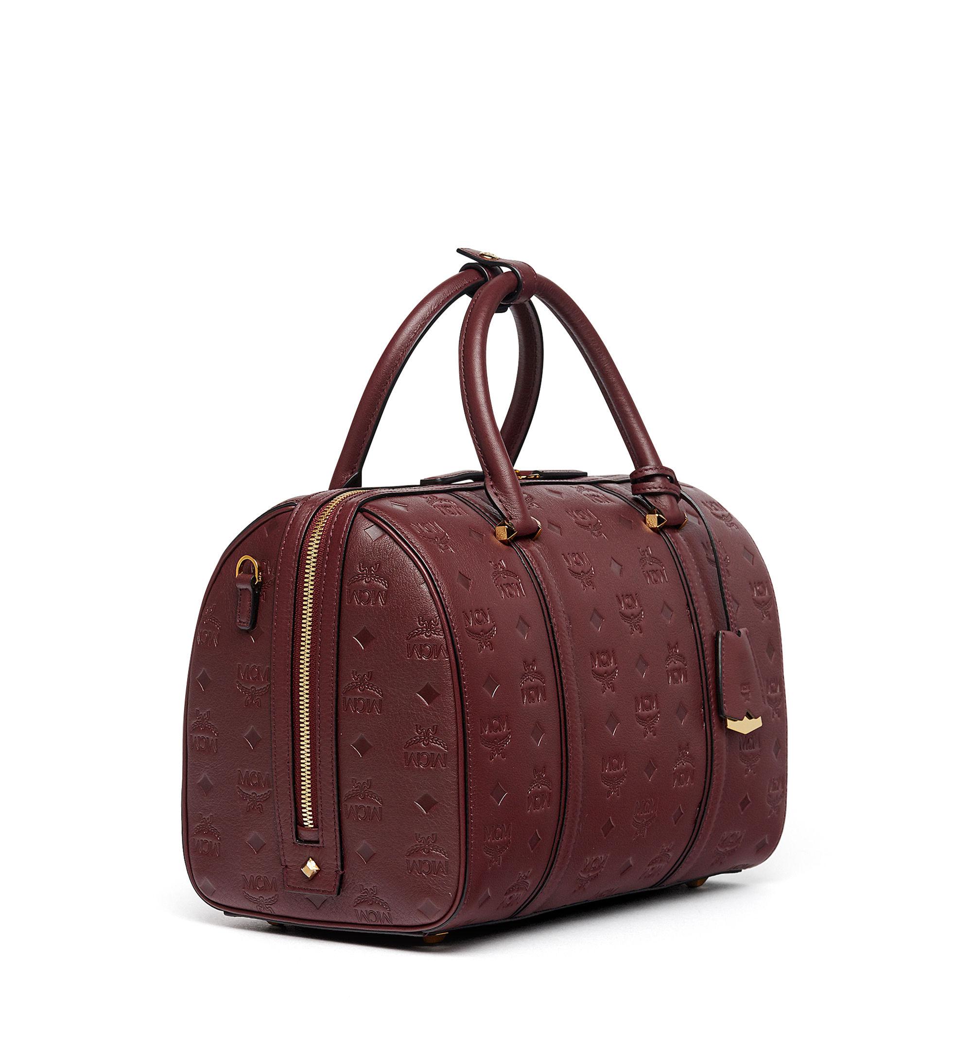 MCM Essential Boston Bag In Monogrammed Leather in Brown - Lyst