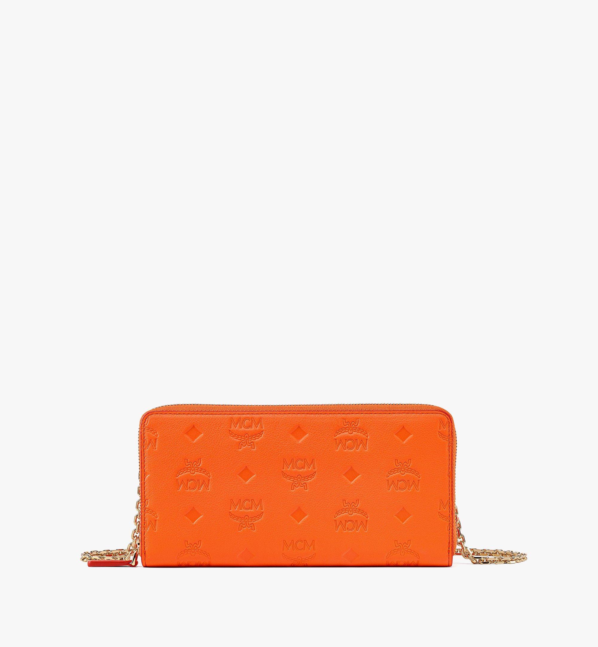 MCM Aren Chain Zip Around Wallet In Embossed Monogram Leather in Orange