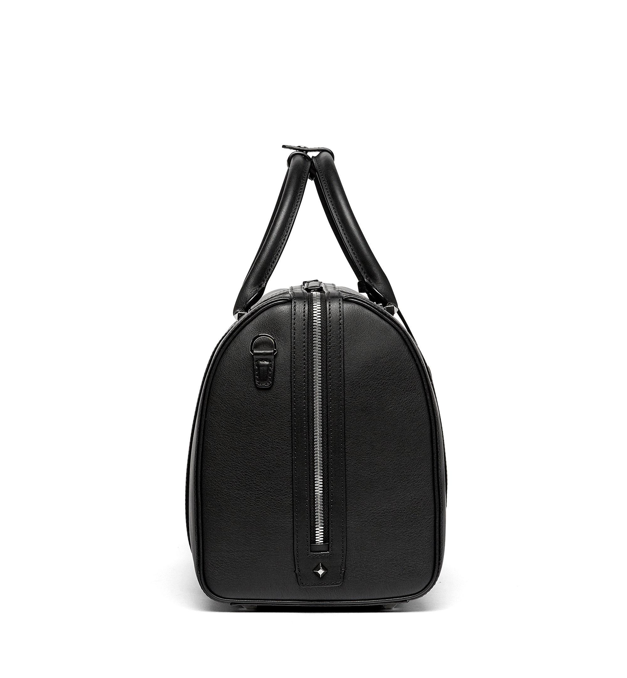 MCM Essential Boston Bag In Calfskin Leather in Black - Lyst