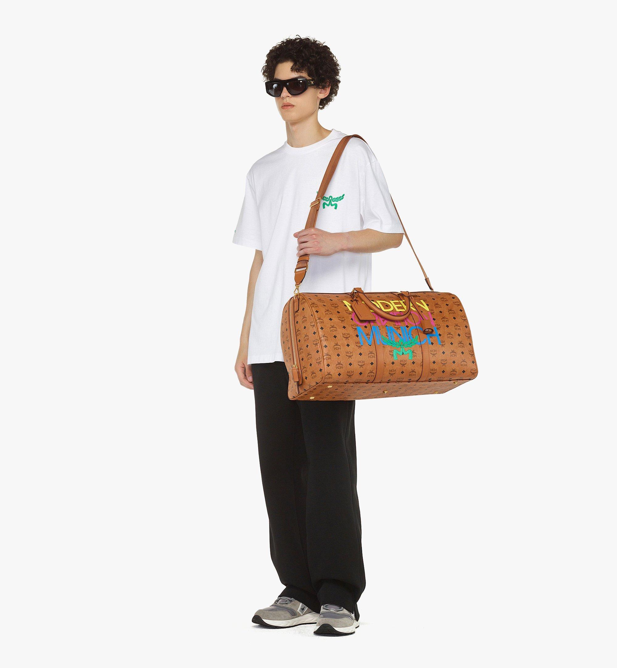 MCM X Honey Dijon Ottomar Weekender Bag In Visetos in Brown for Men Lyst