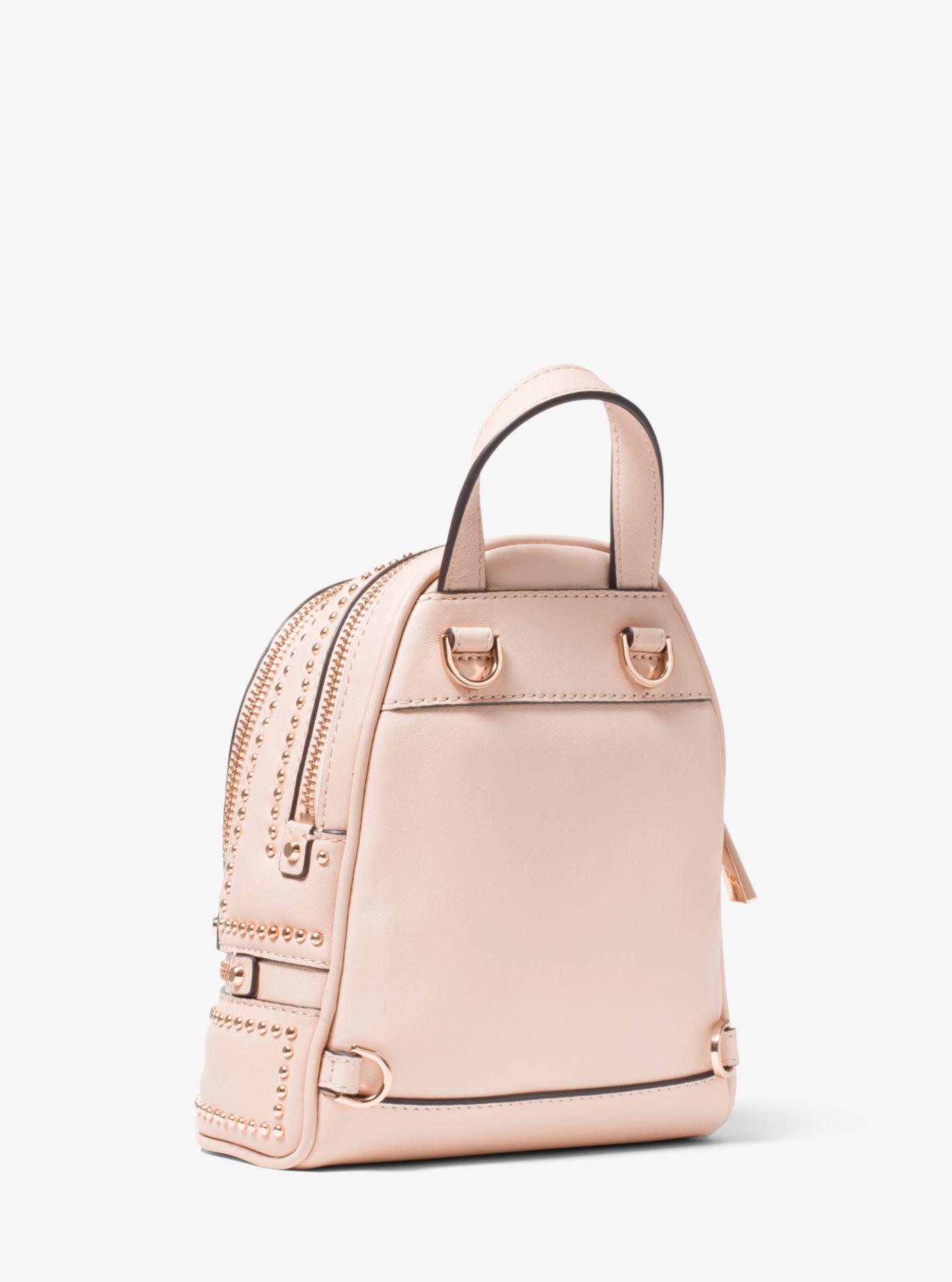 rhea mini rose studded leather backpack