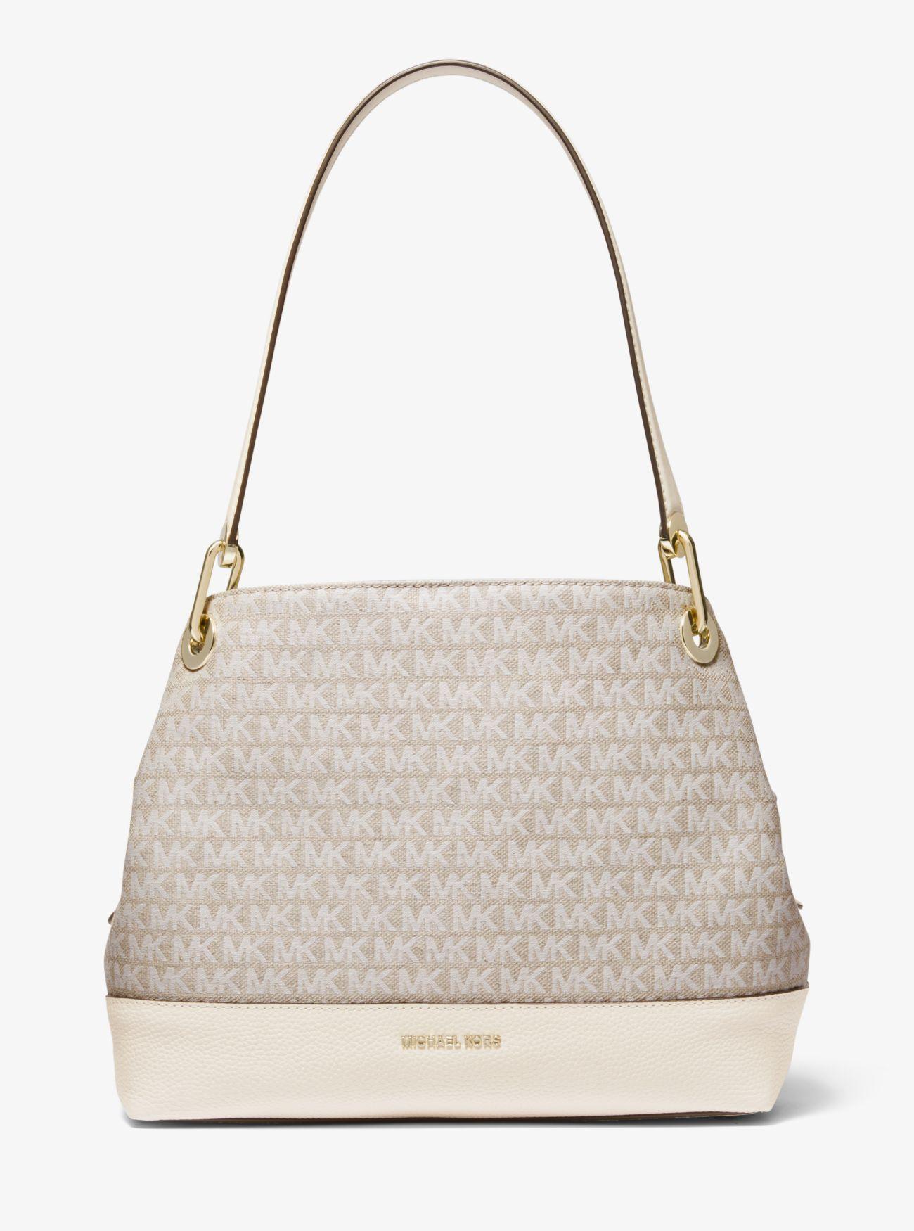 raven logo shoulder bag