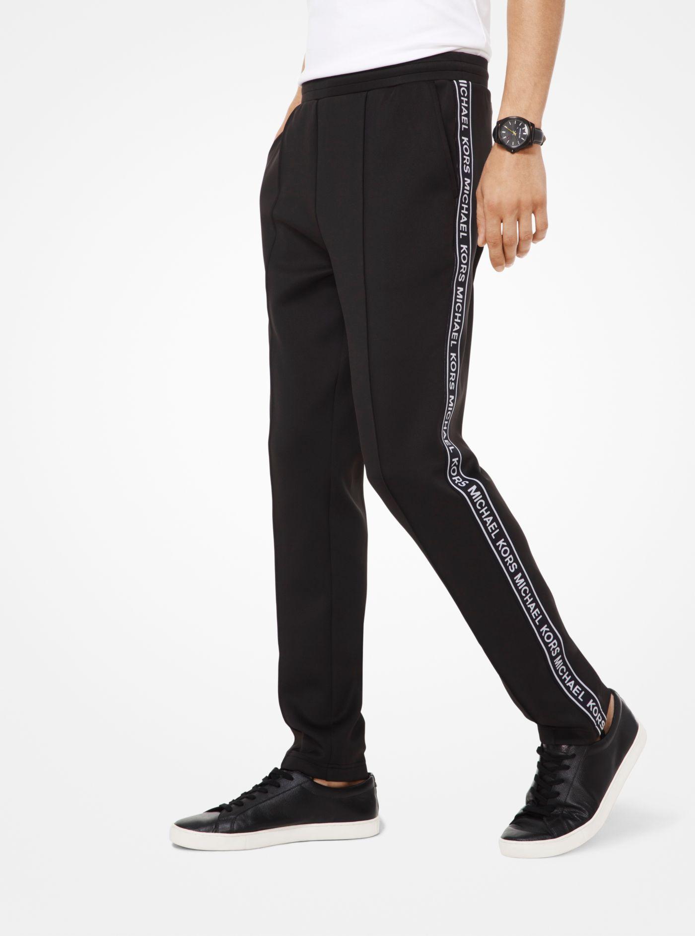 Pantaloni da tuta in tessuto scuba con fettuccia con logoMichael Kors in  Materiale sintetico da Uomo colore Nero | Lyst