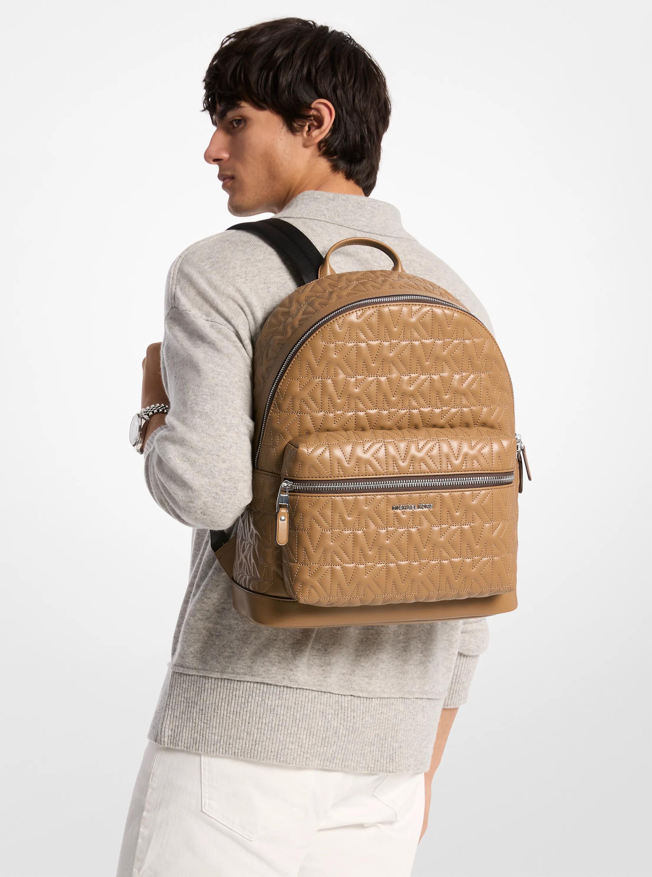 Michael Kors Mk Hudson Medium Logo Embossed Dome Backpack in 