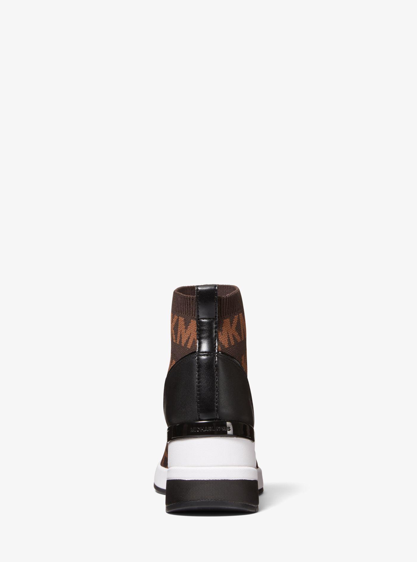 Michael Kors Skyler Logo Stretch Knit Sock Sneaker in Brown | Lyst
