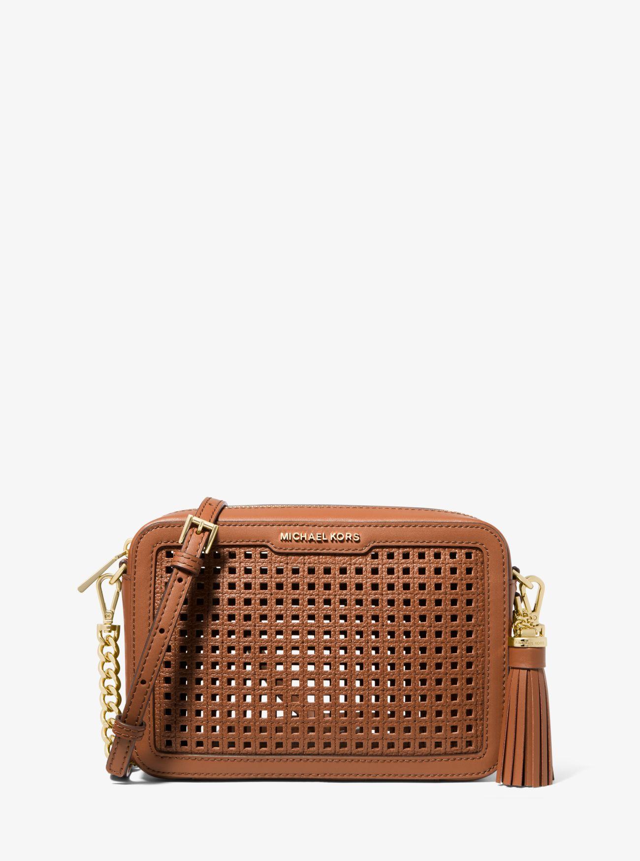 Michael Kors Umhangetasche Ginny Medium Aus Perforiertem Leder Lyst DE