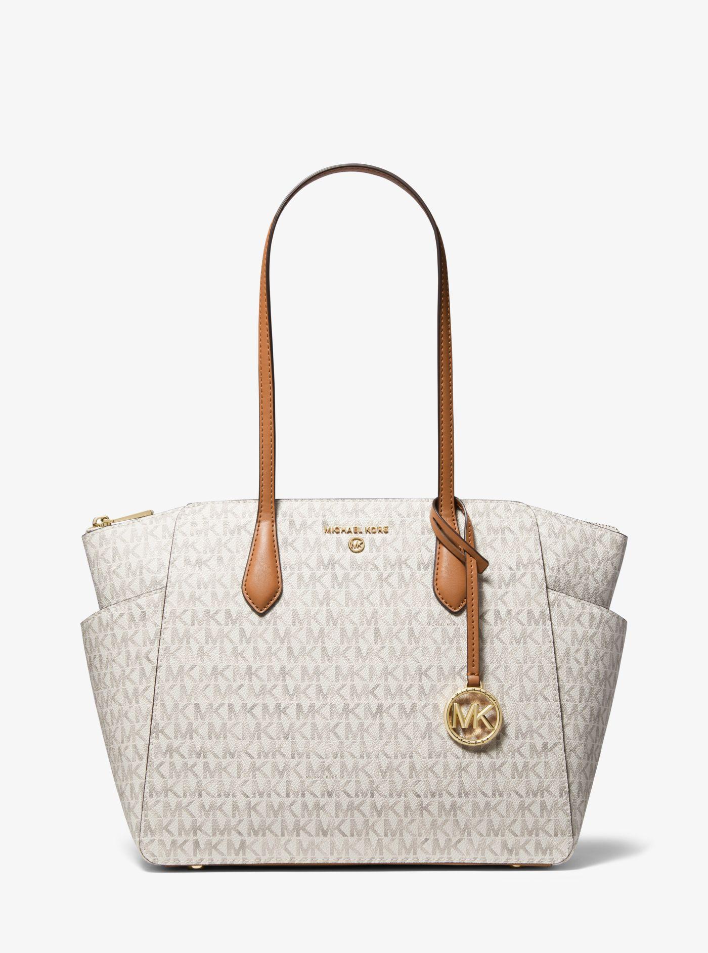 mk's tote bolsas and monogramming