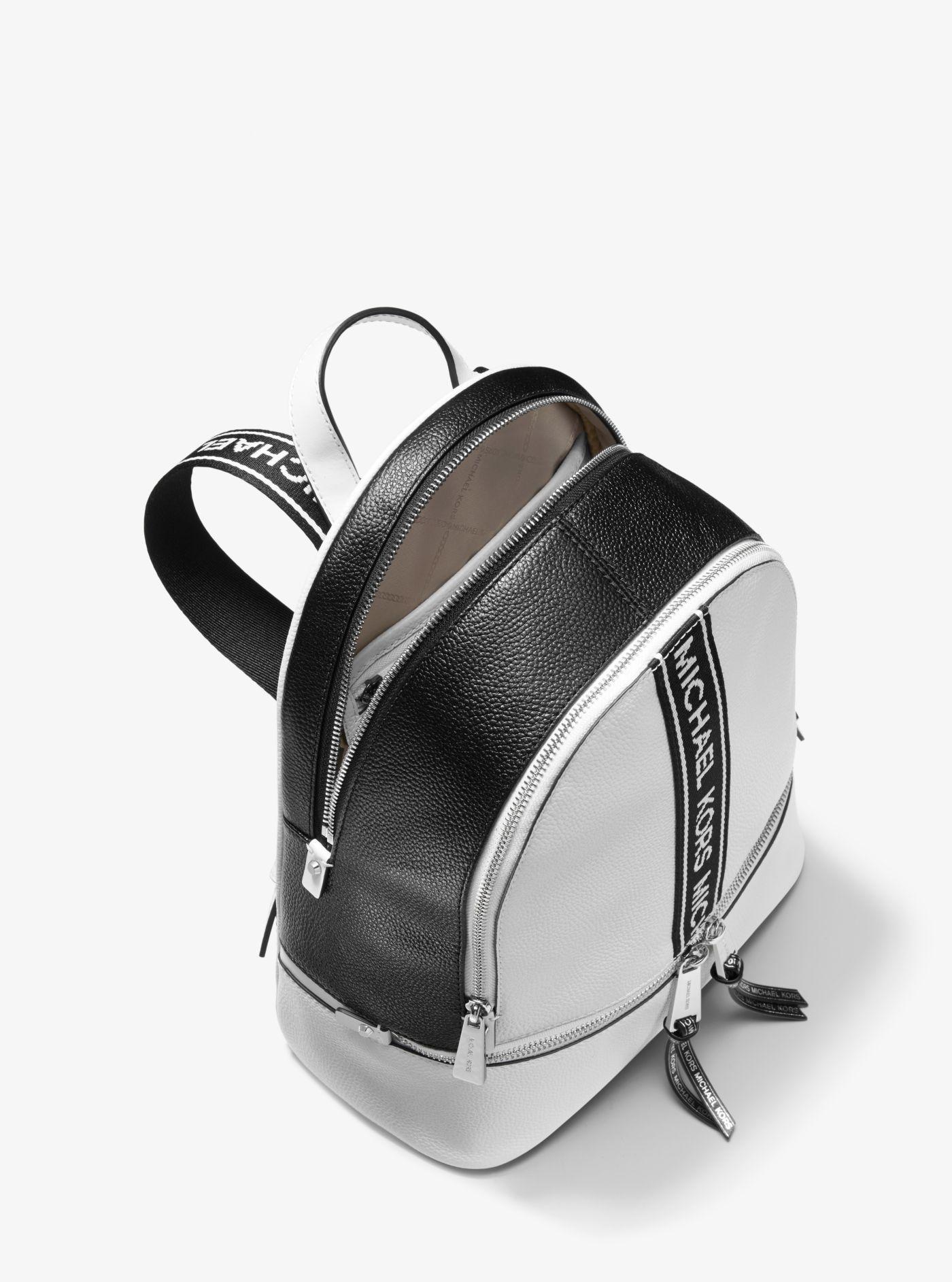 black and white michael kors backpack