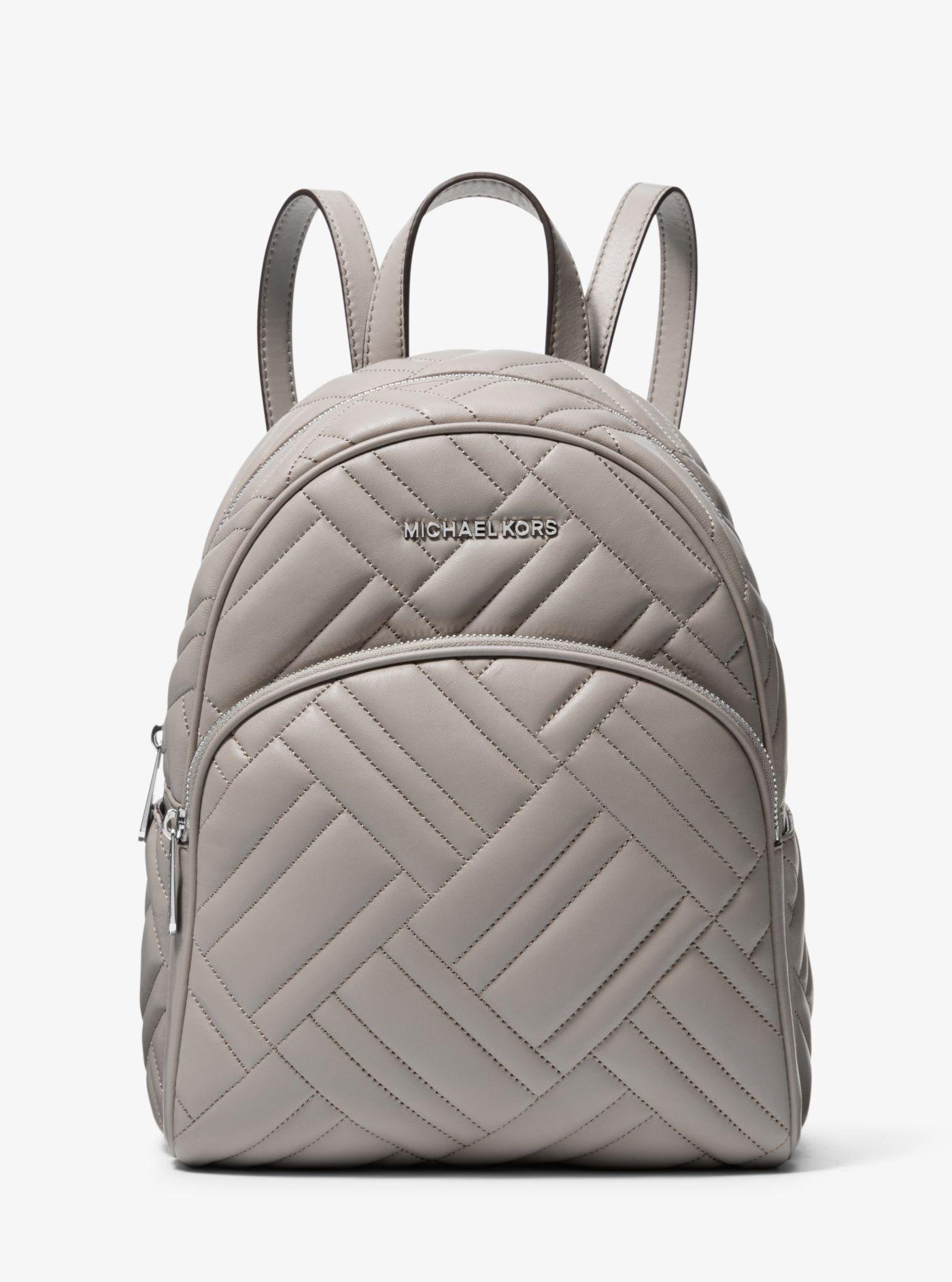 mk quilted backpack