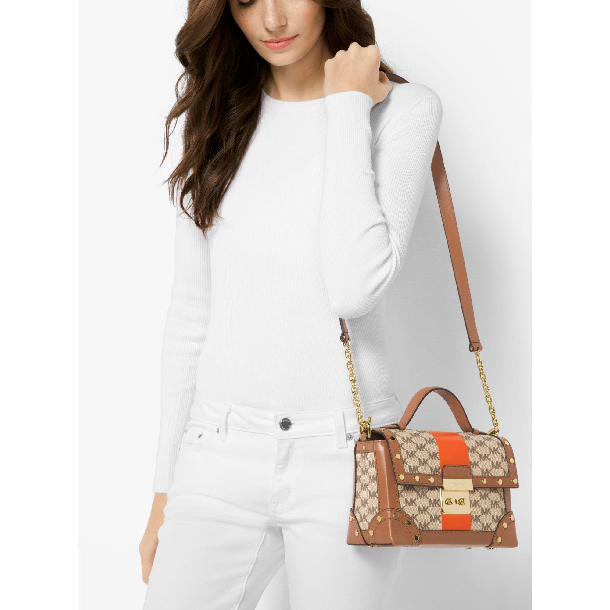 michael kors cori trunk bag