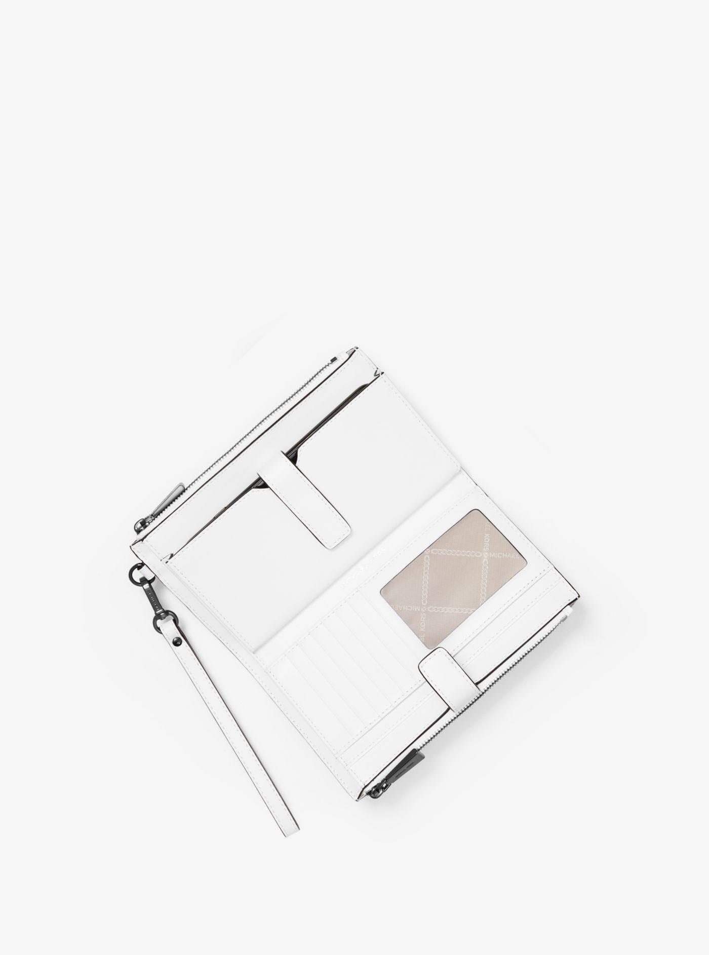 Adele newsprint logo leather smartphone wallet Clearance