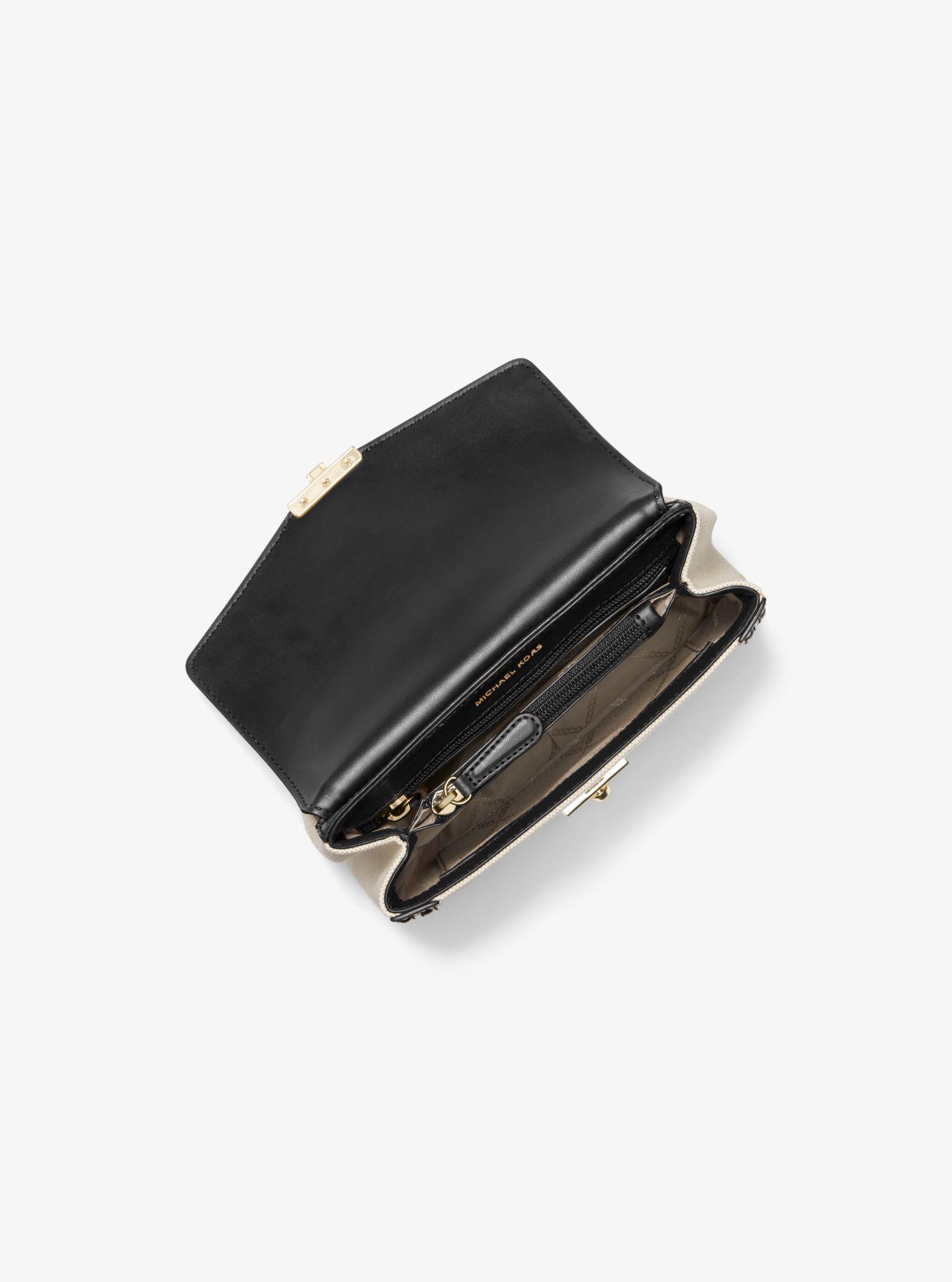 soho small studded leather and canvas shoulder bag