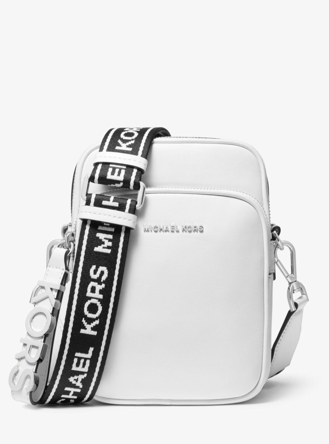 MICHAEL Michael Kors Medium Leather Logo Tape Crossbody Bag in White | Lyst
