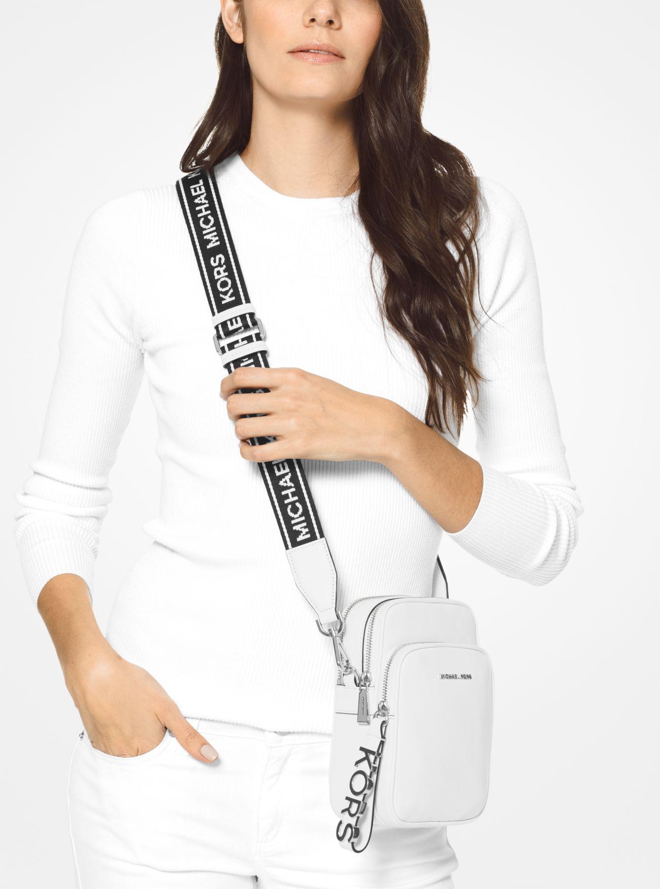 MICHAEL Michael Kors Medium Leather Logo Tape Crossbody Bag in White | Lyst