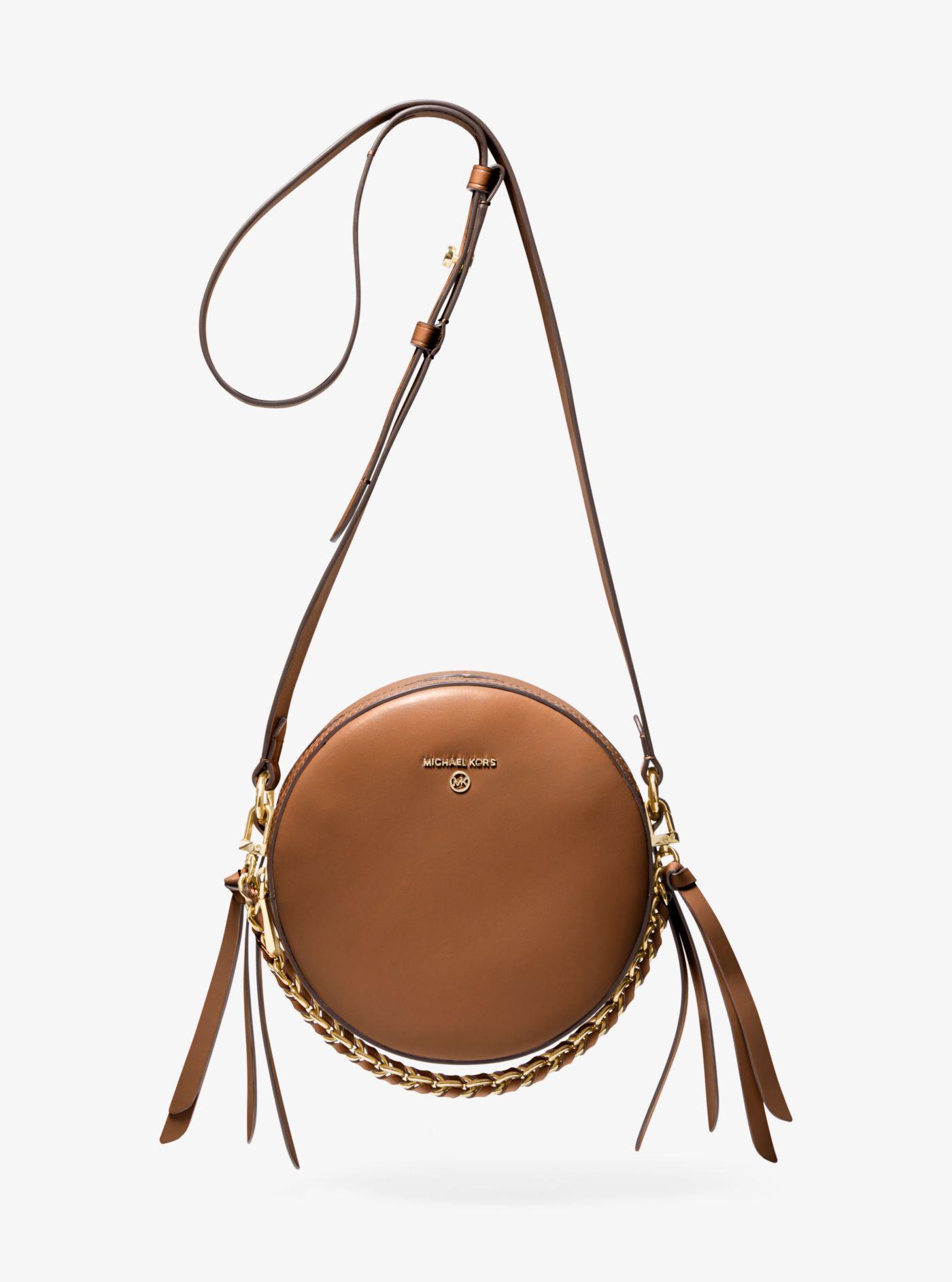 michael kors round sling bag