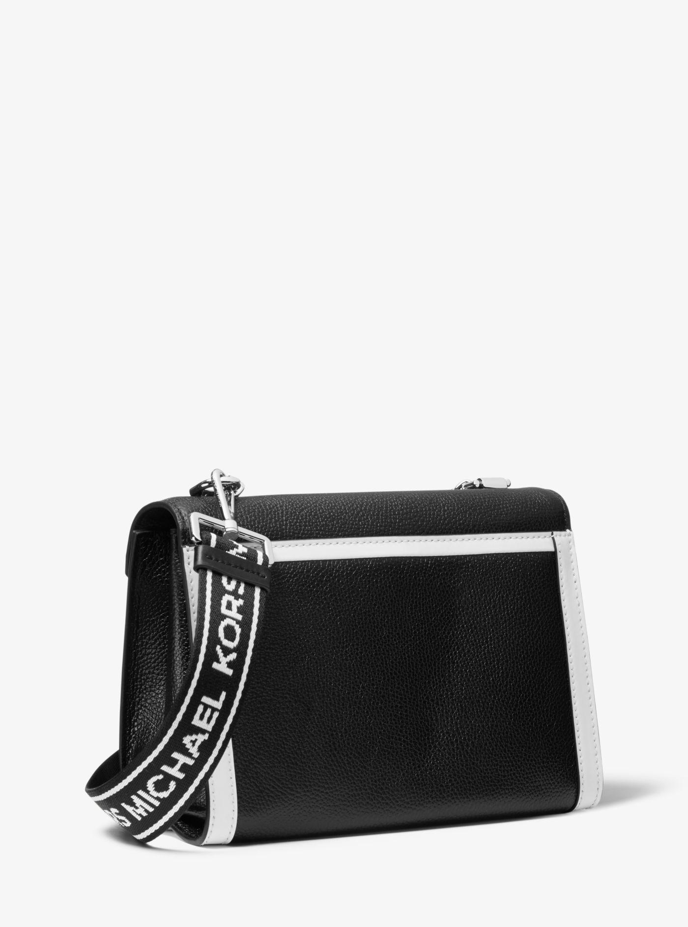whitney large pebbled leather convertible shoulder bag