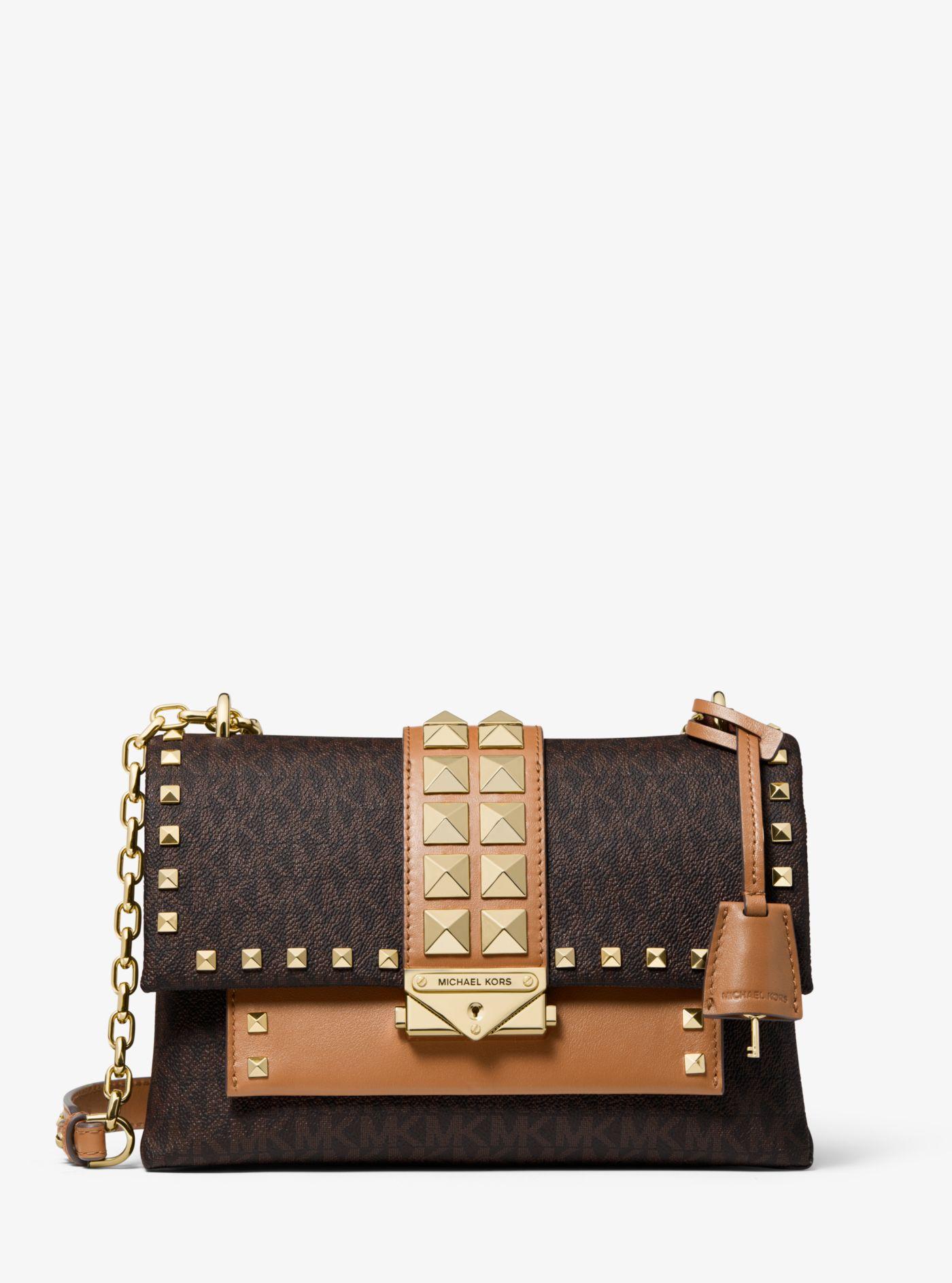 cece large studded leather and logo convertible crossbody bag