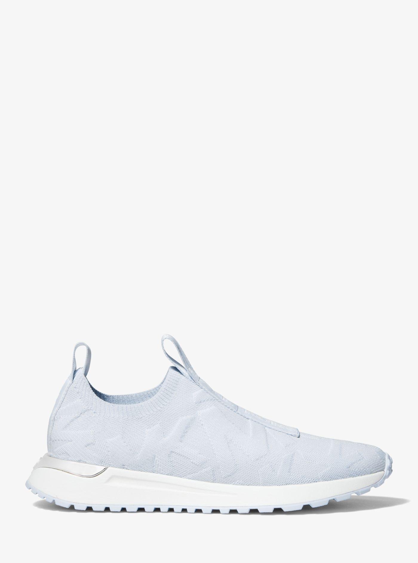 Michael Kors Bodie Logo Embossed Stretch Knit Slip-on Trainer in White |  Lyst